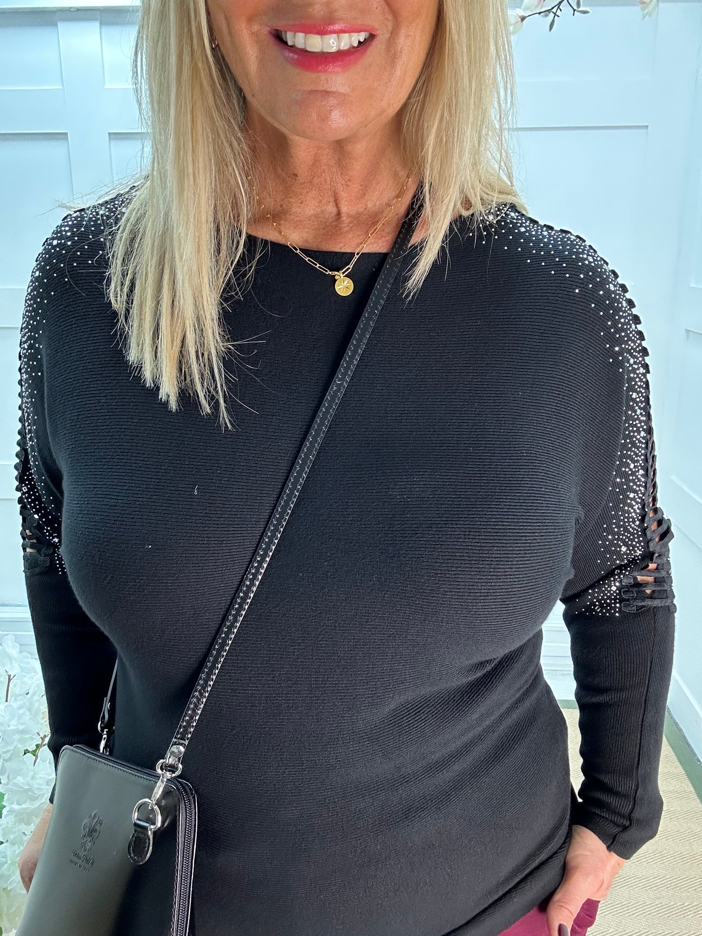 Arianne: Black sparkle cutout shoulder top. One size: 12-16