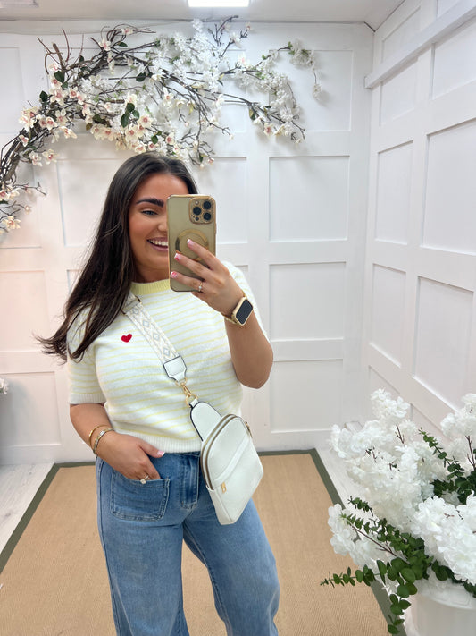 Sonia: White crossbody satchel bag.