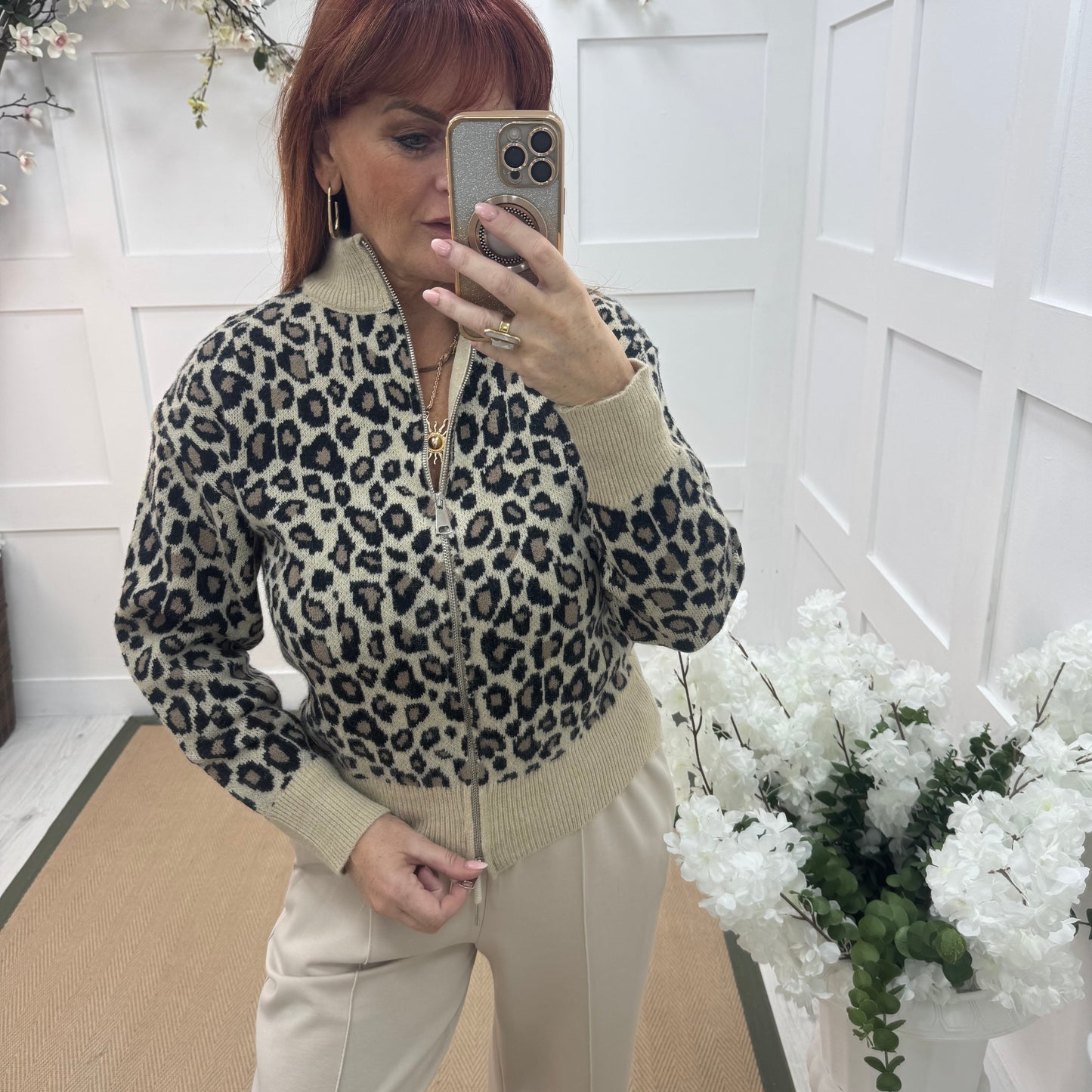 Ursula: Cream leopard print zipped neck top. One size: 12-18
