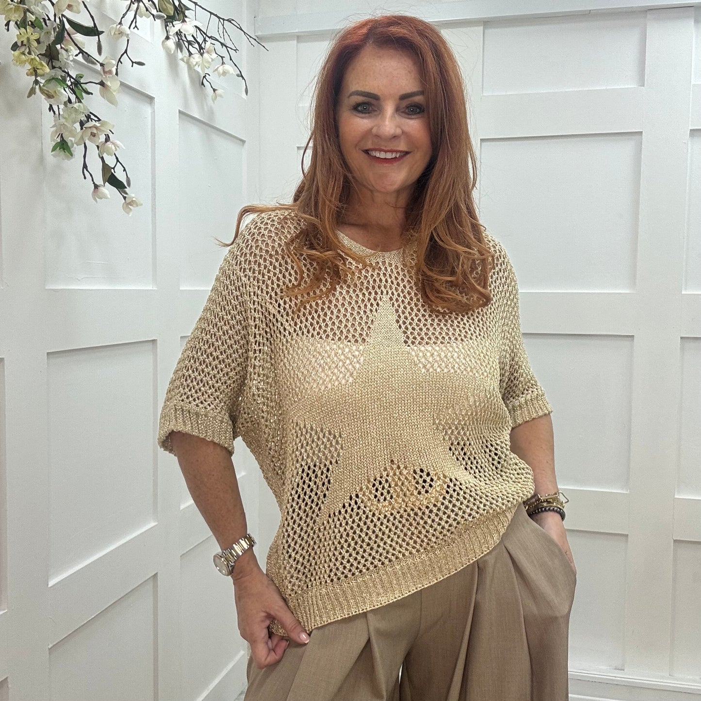 Maggie: Gold stretchy lurex knit star top. One size: 10-18