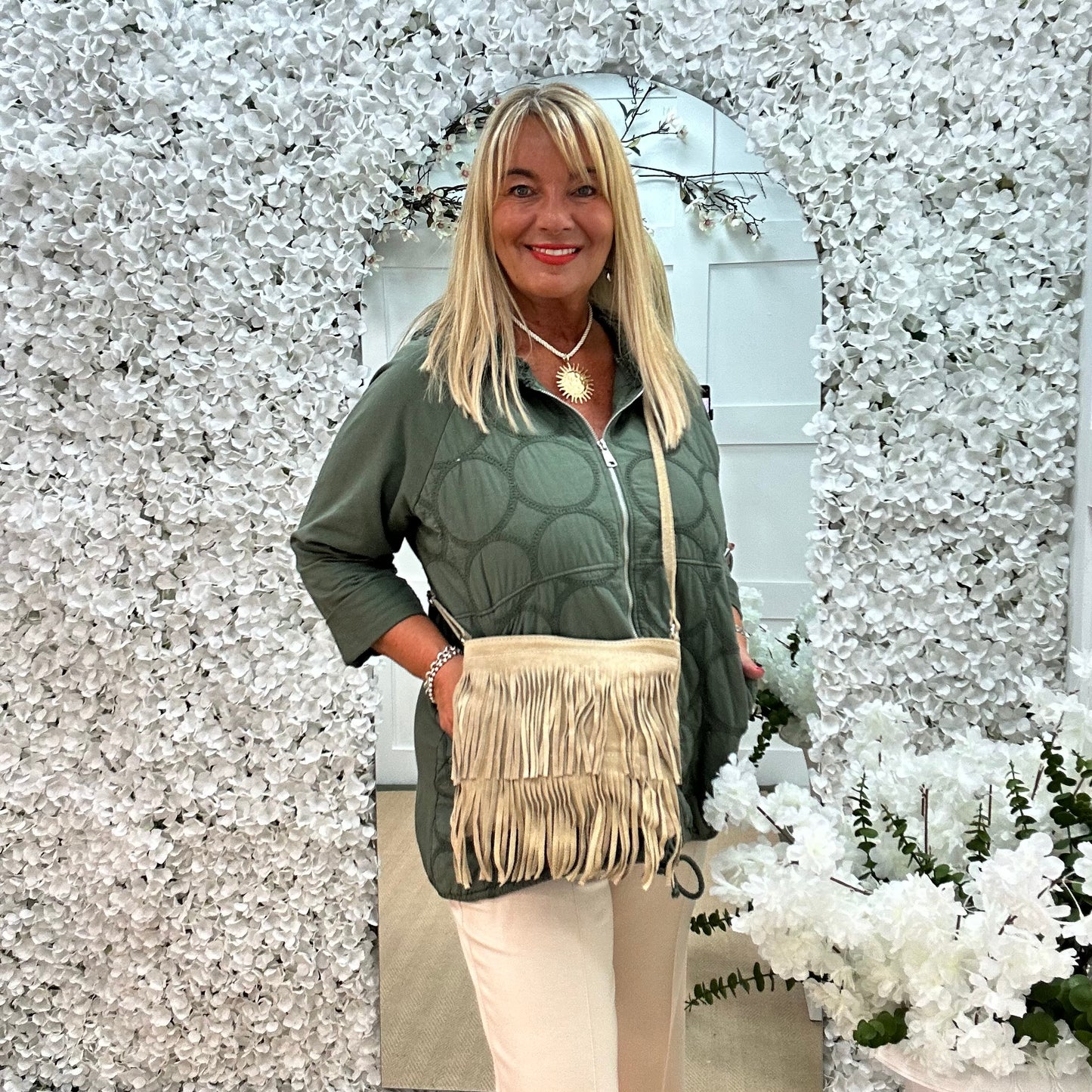 Tanya: Cream real suede tassel cross body bag.