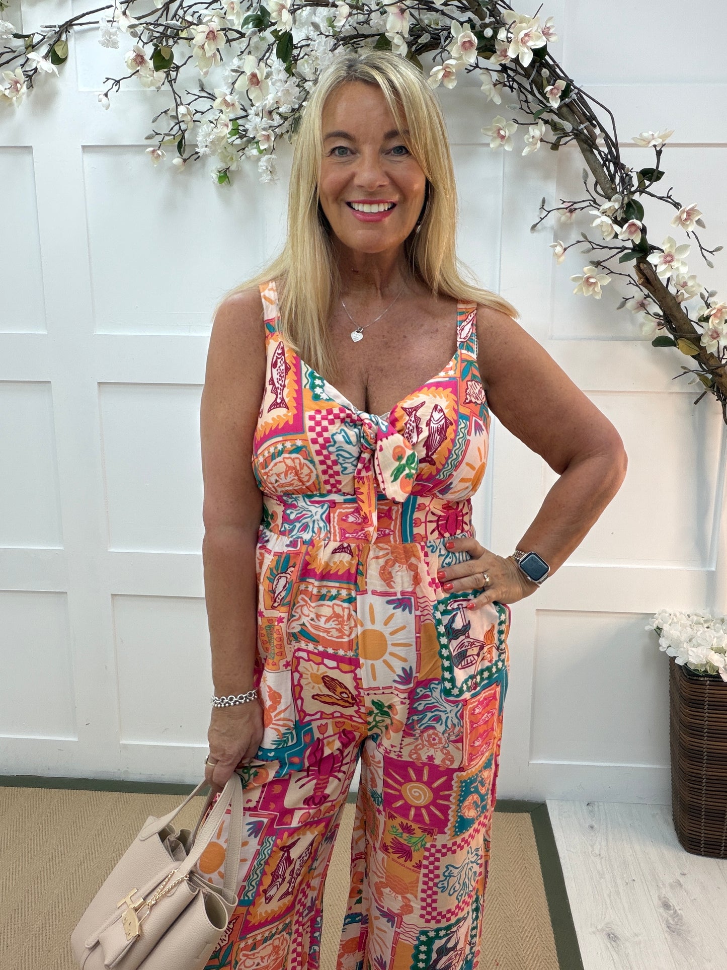 Joley: Orange printed wide leg jumpsuit. 3 sizes