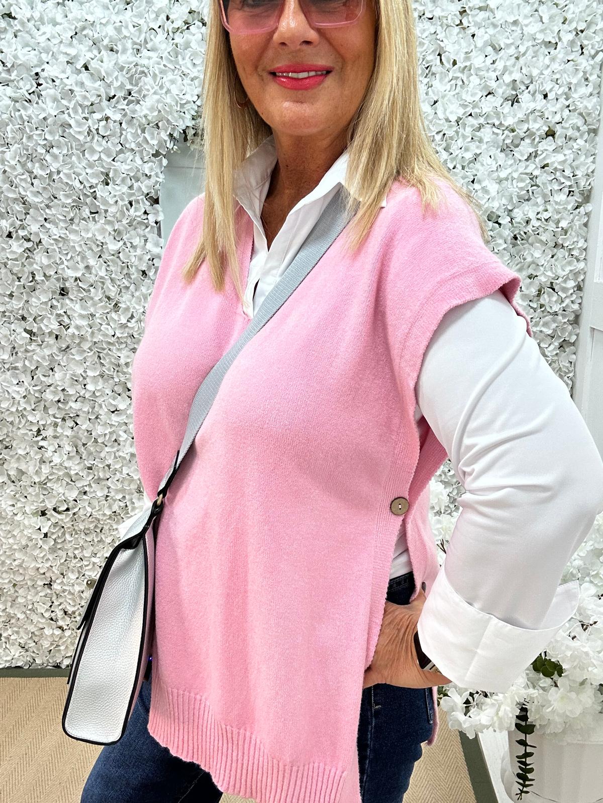 Phoenix: Pink button knit top. One size: 14-20