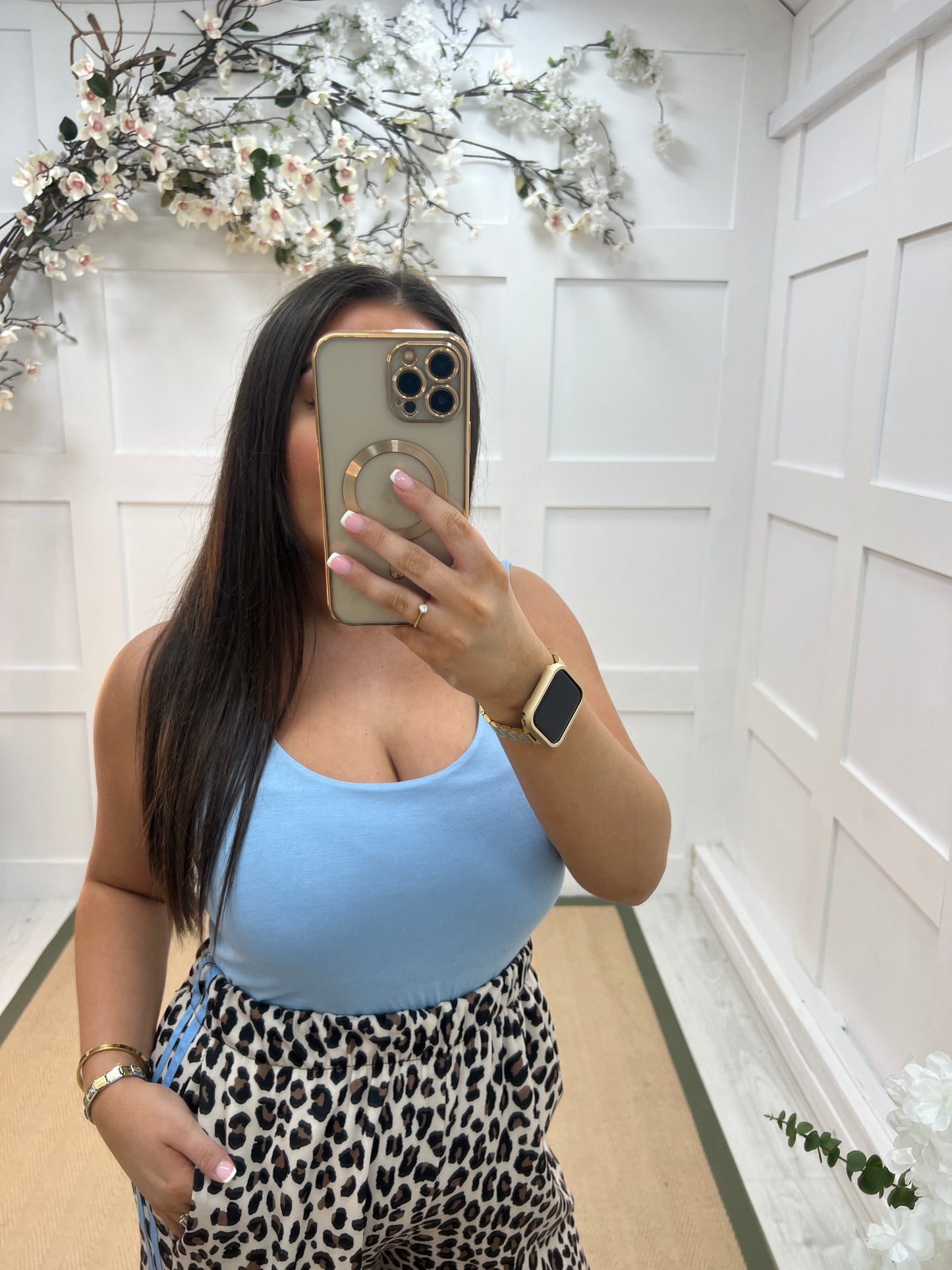 Abigail: Stretchy baby blue basic vest top. 2 sizes