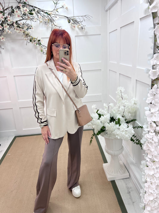 Ines: Cream sports stripe sleeve blazer. One size: 12-16