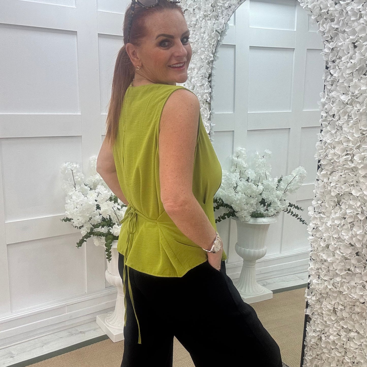 Maisie: Lime tie waist peplum top. One size: 14-18