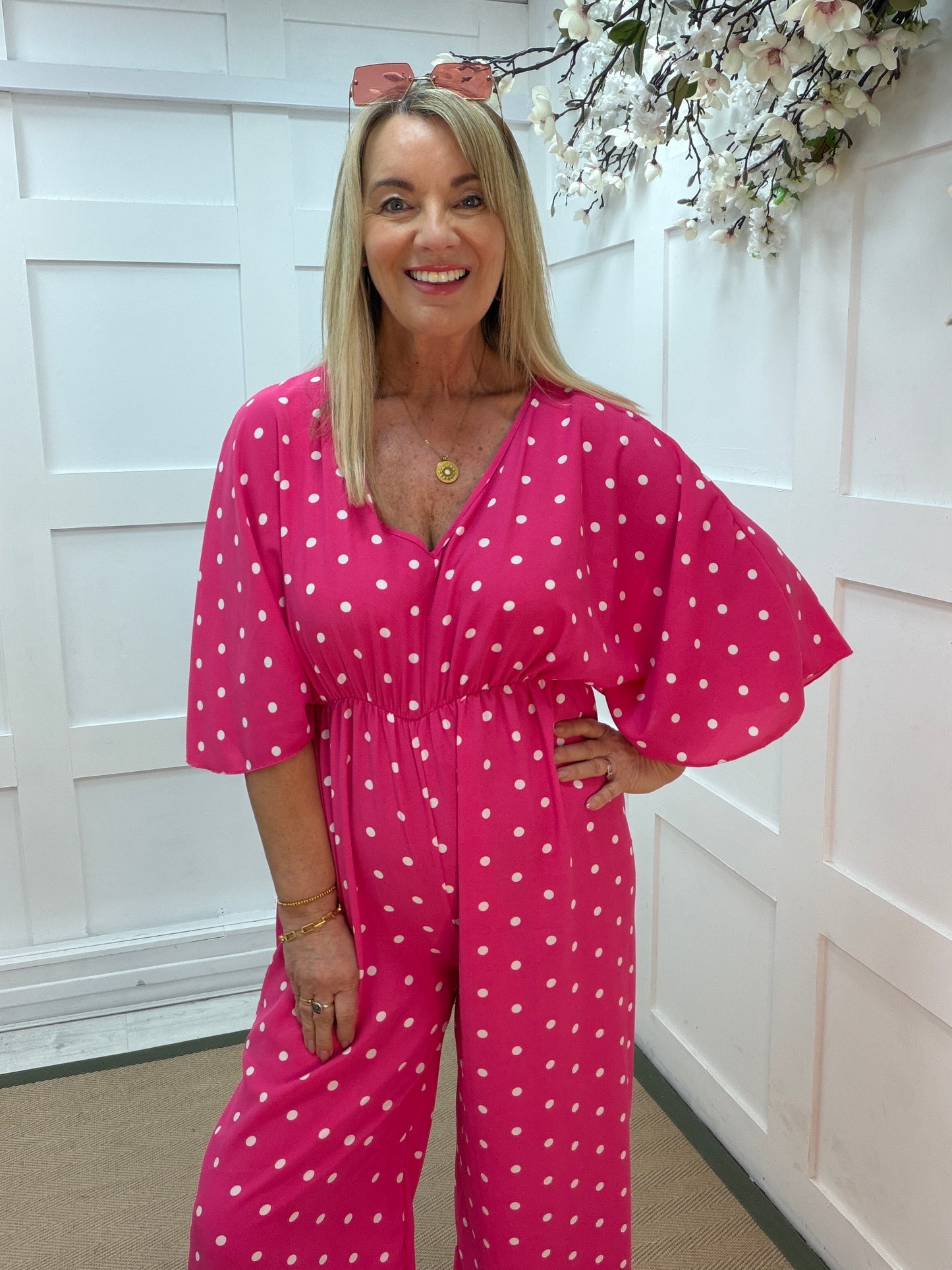Amalia: Pink and white spotty wide leg jumpsuit. One size: 14-18