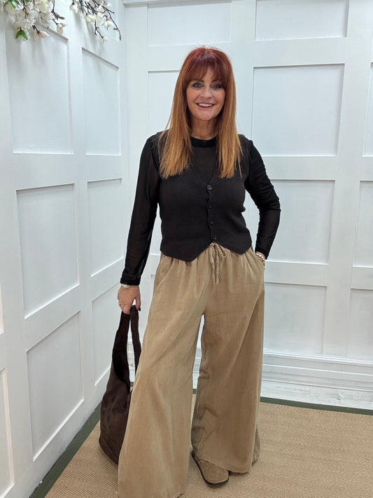 Lark: Sand needle cord wide trousers. One Size: 8-16