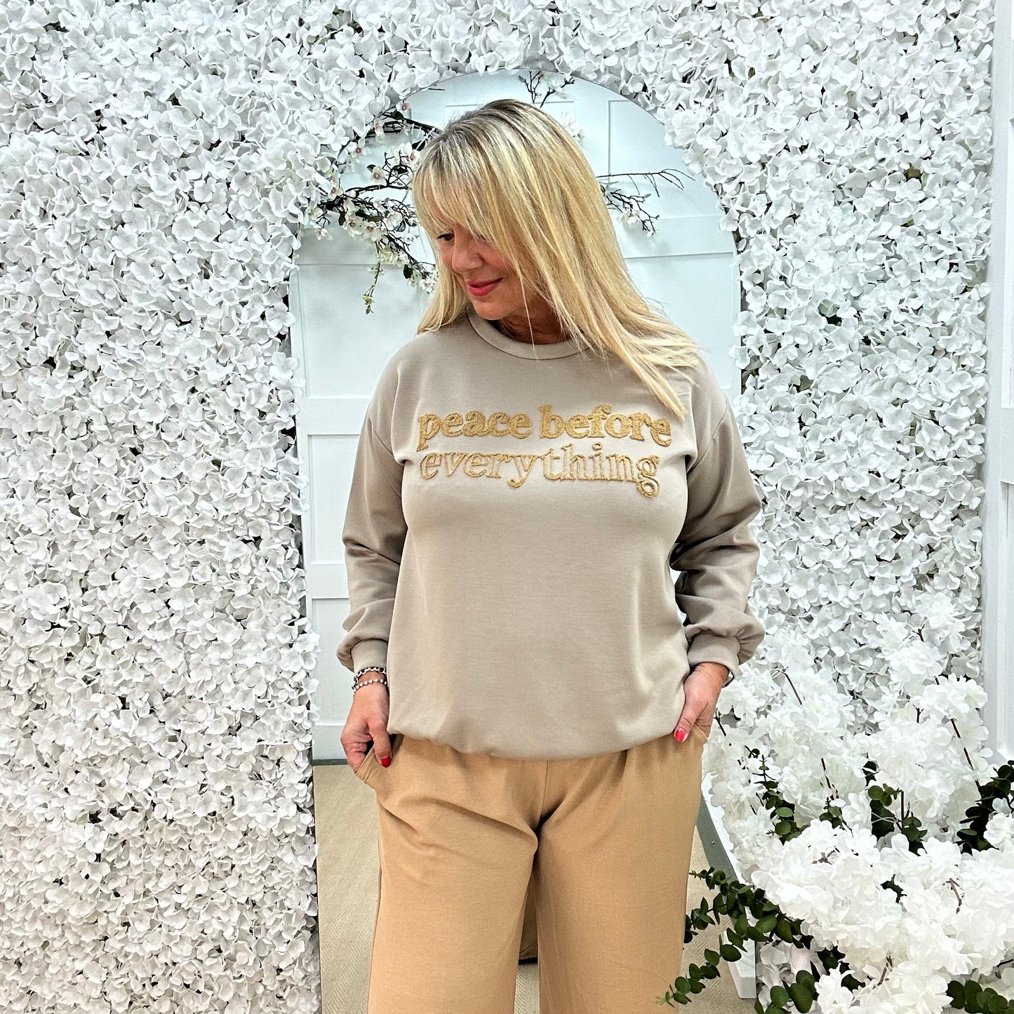 Prya: Mocha oversized Peace slogan sweatshirt. One size: 14-20