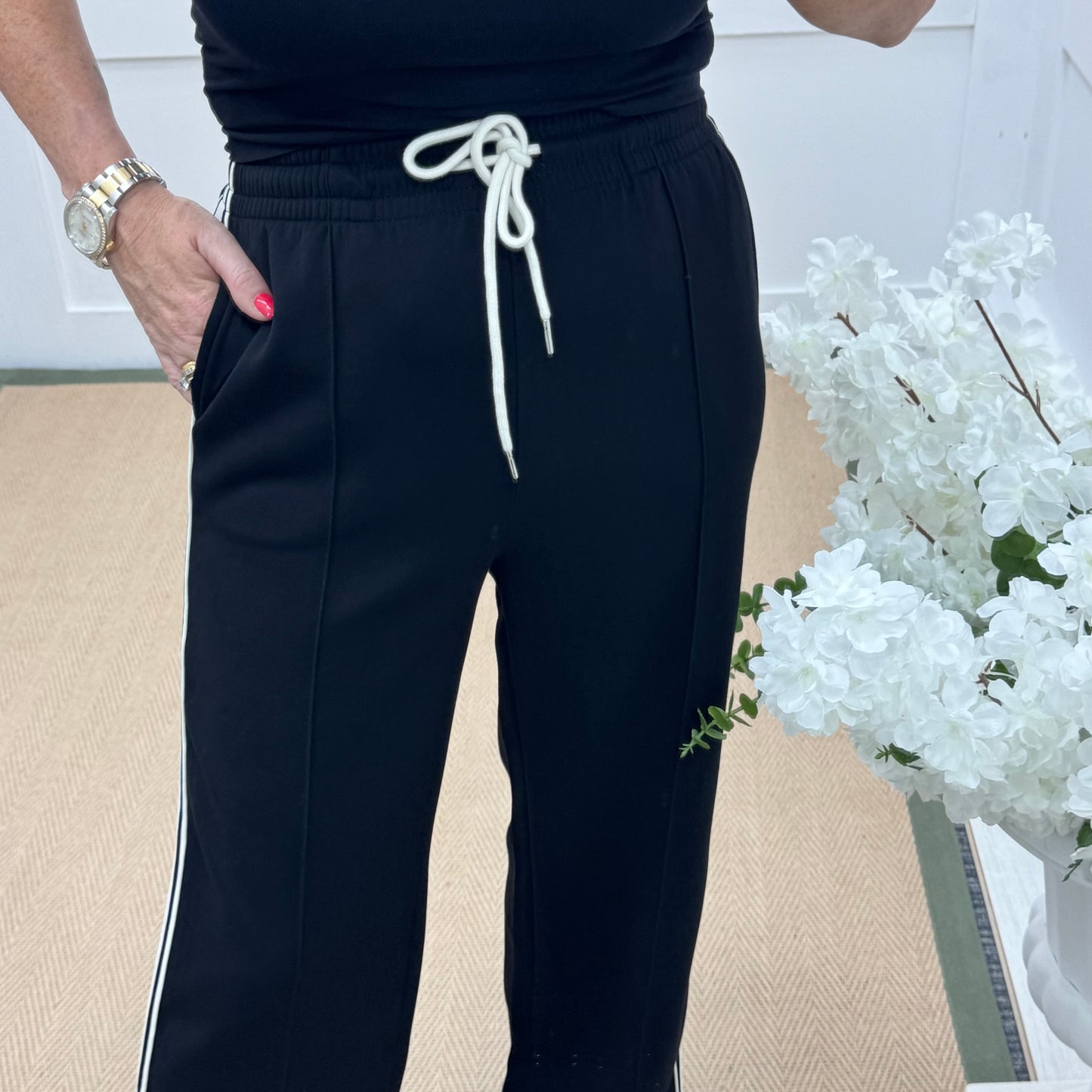 Roxi: Black stretchy pocket sports trousers. 3 sizes