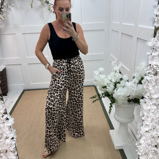 Paige: Leopard print wide leg trousers. One Sz: 10-16