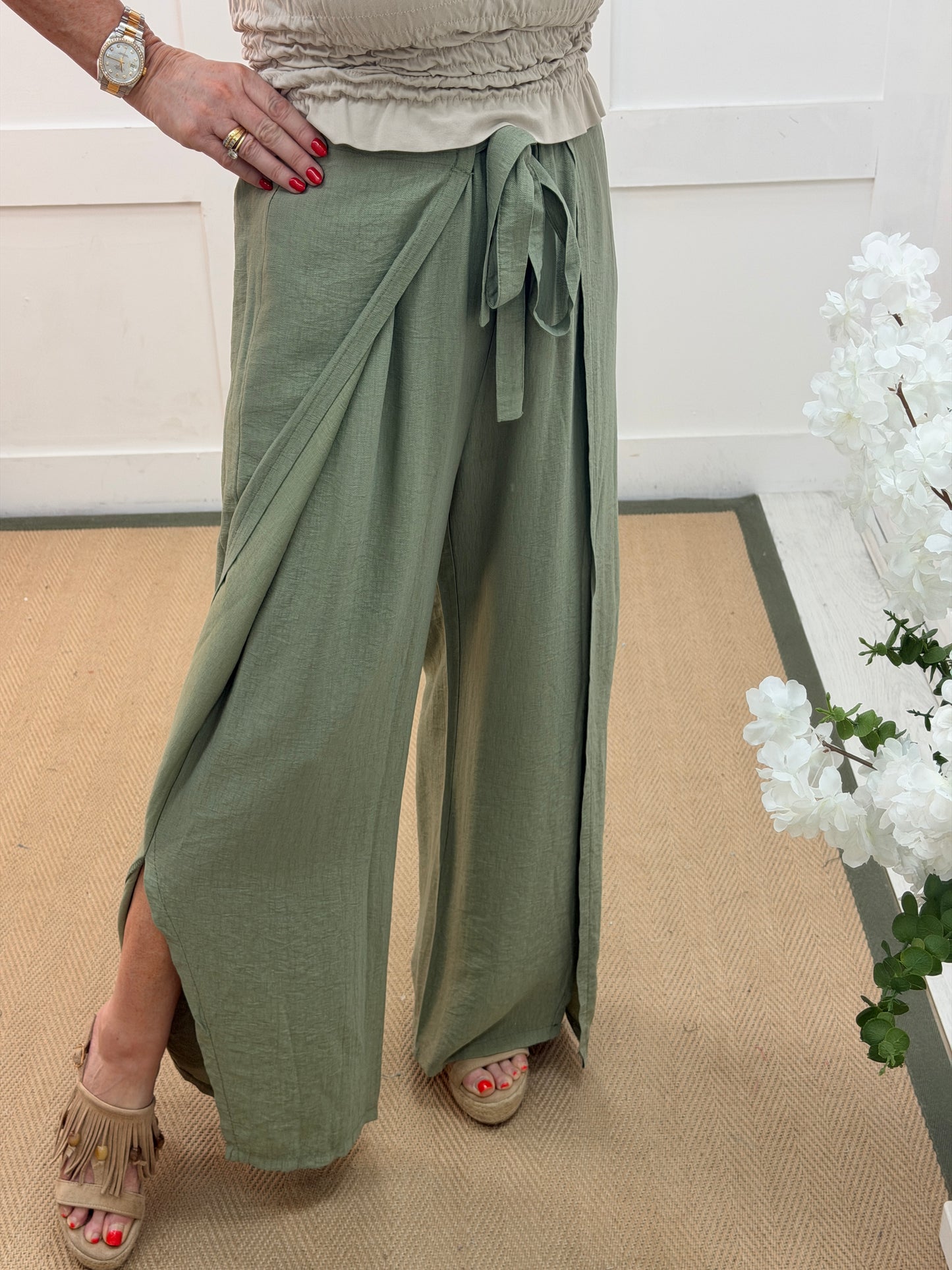 Eden: Khaki tie waist wide leg trousers. One size: 10-16
