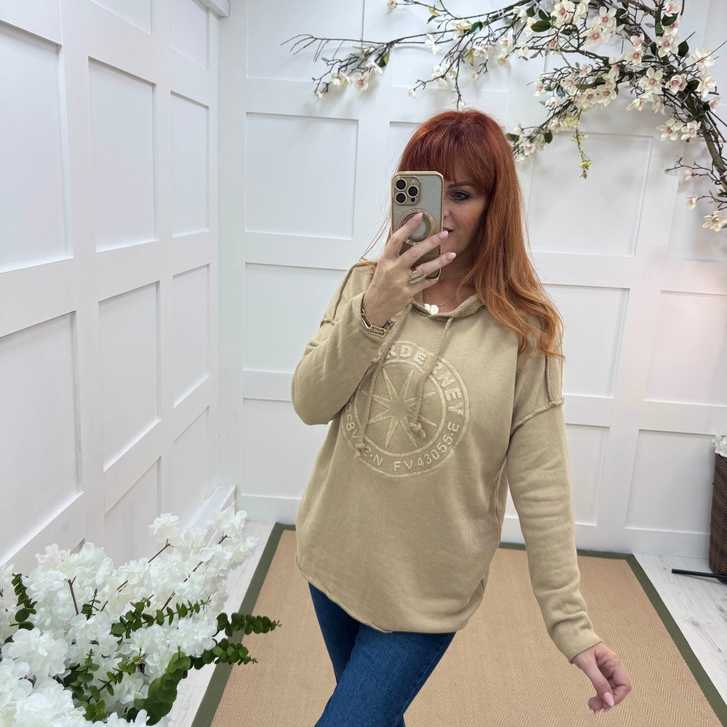 Sara: Sand hooded embossed compass top. One size: 12-18