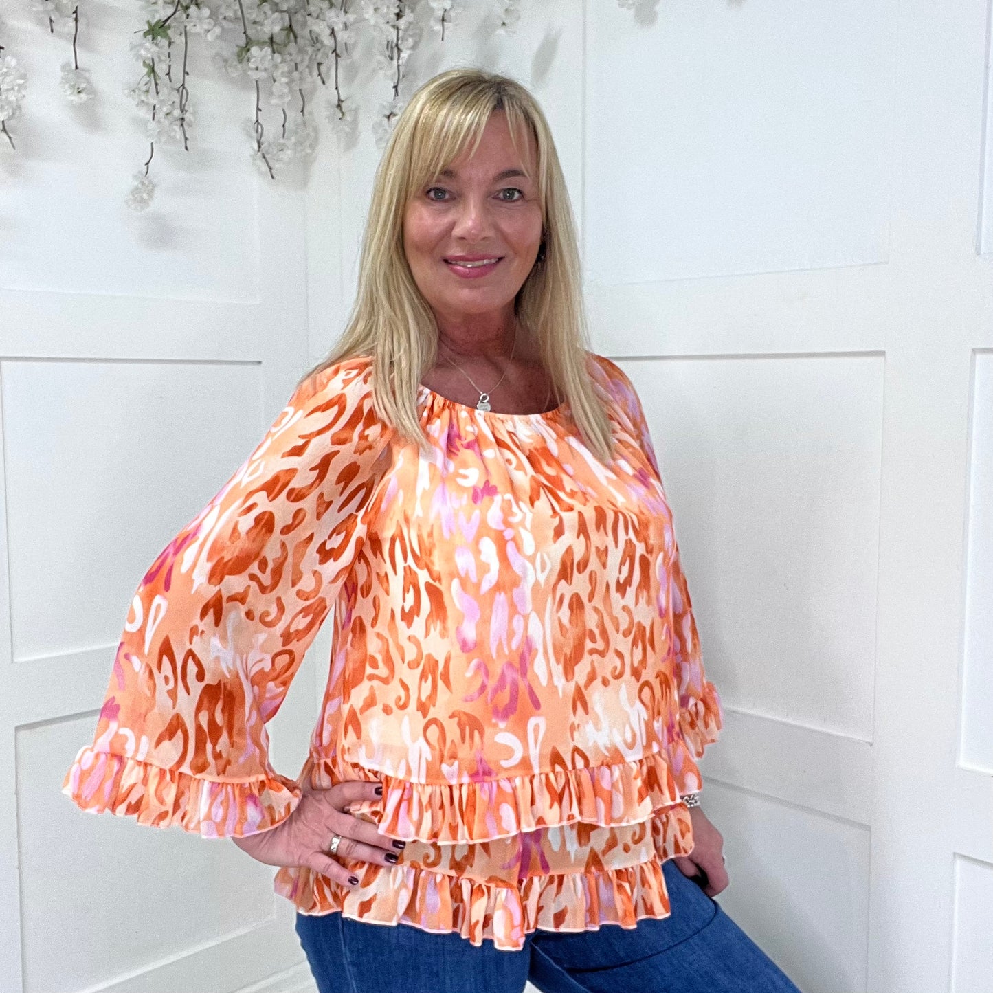 Foxy: Orange double frill chiffon top. One size: 10-20