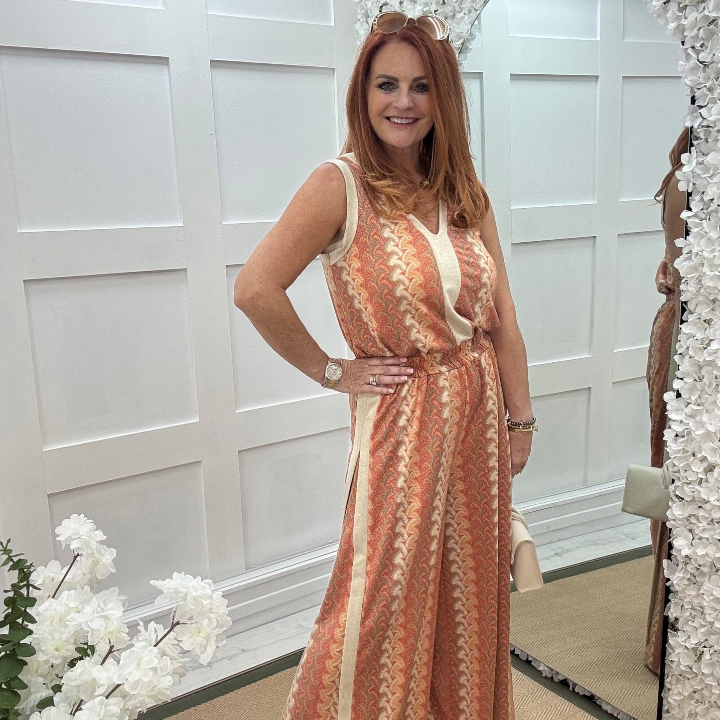 Pasha: Orange zigzag top & printed trouser co-ord set. One size: 12-18