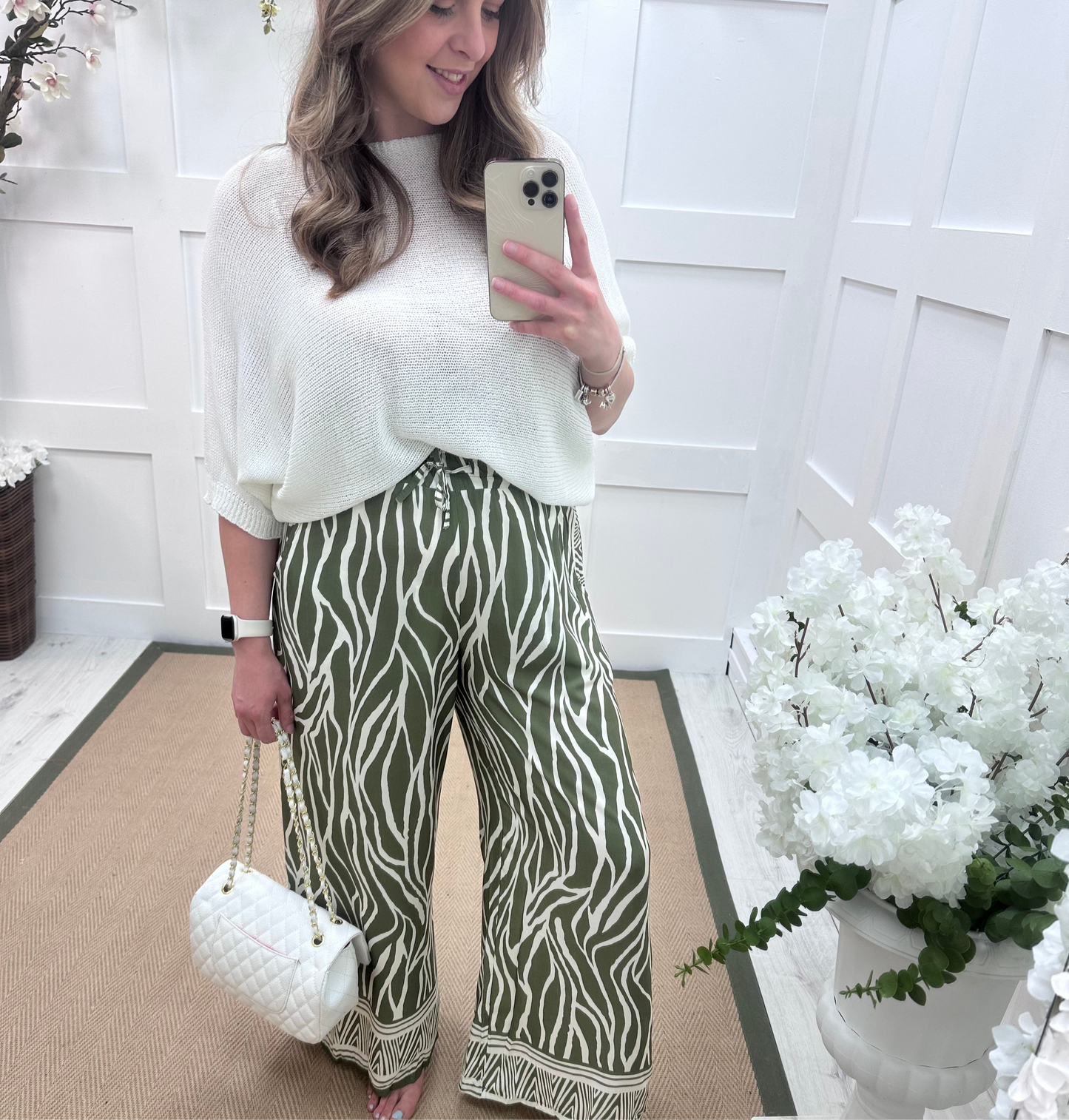 Skye: Khaki zebra print wide leg trousers. One size: 10-16