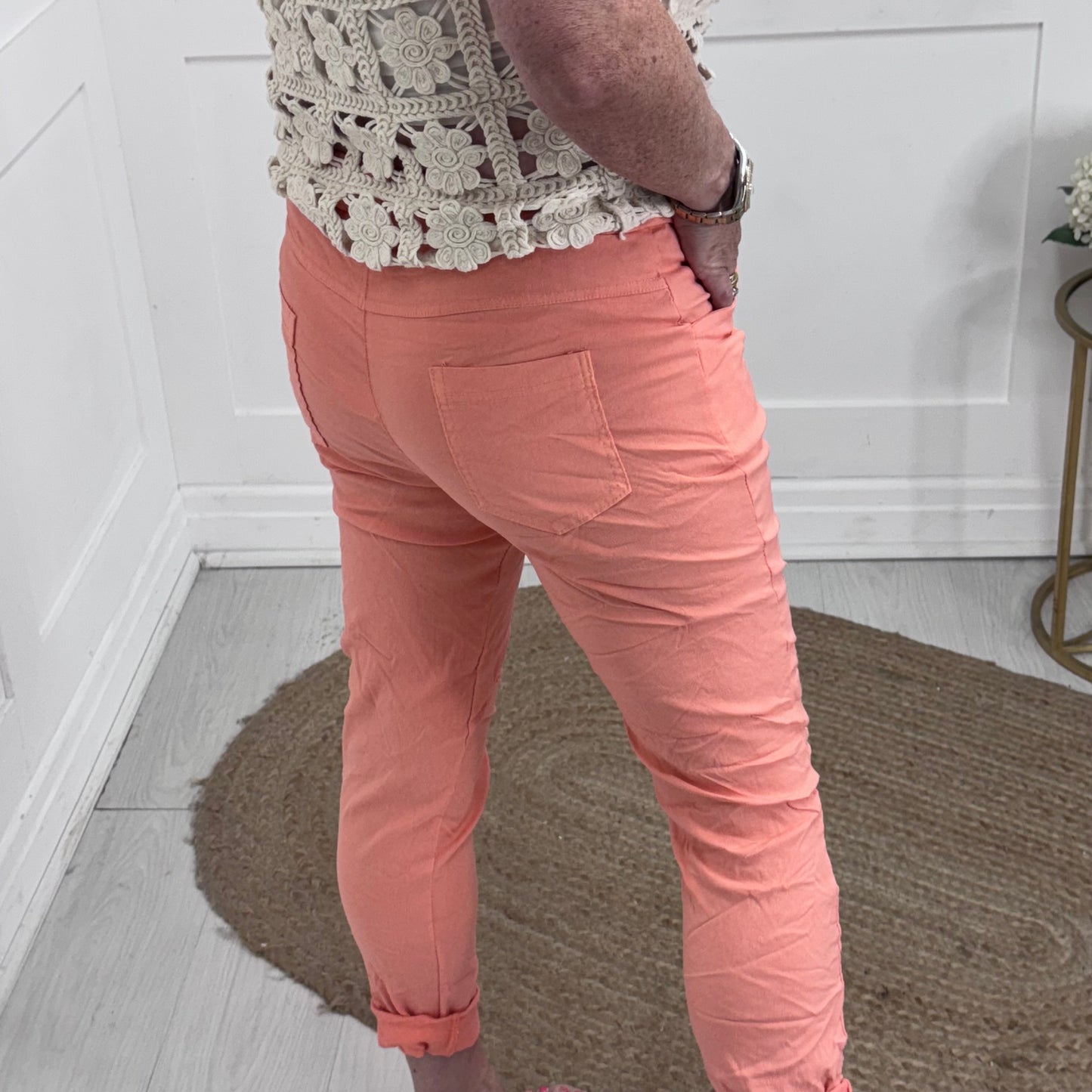 Marnie: Stretchy peach magic trousers with rear pockets. 3 Sizes: 10-22