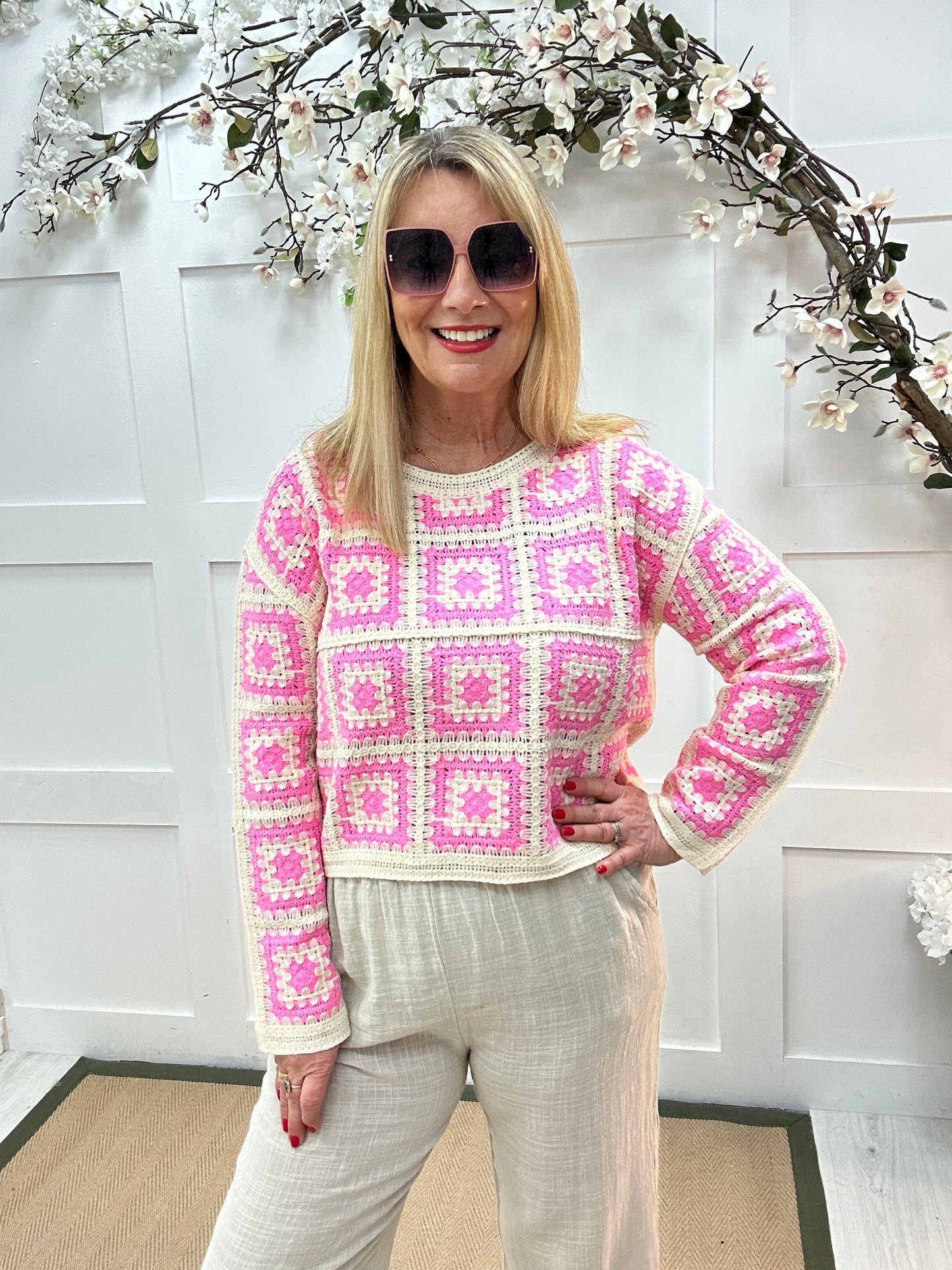 Carly: Pink and cream long sleeve crochet top. One size: 14-18