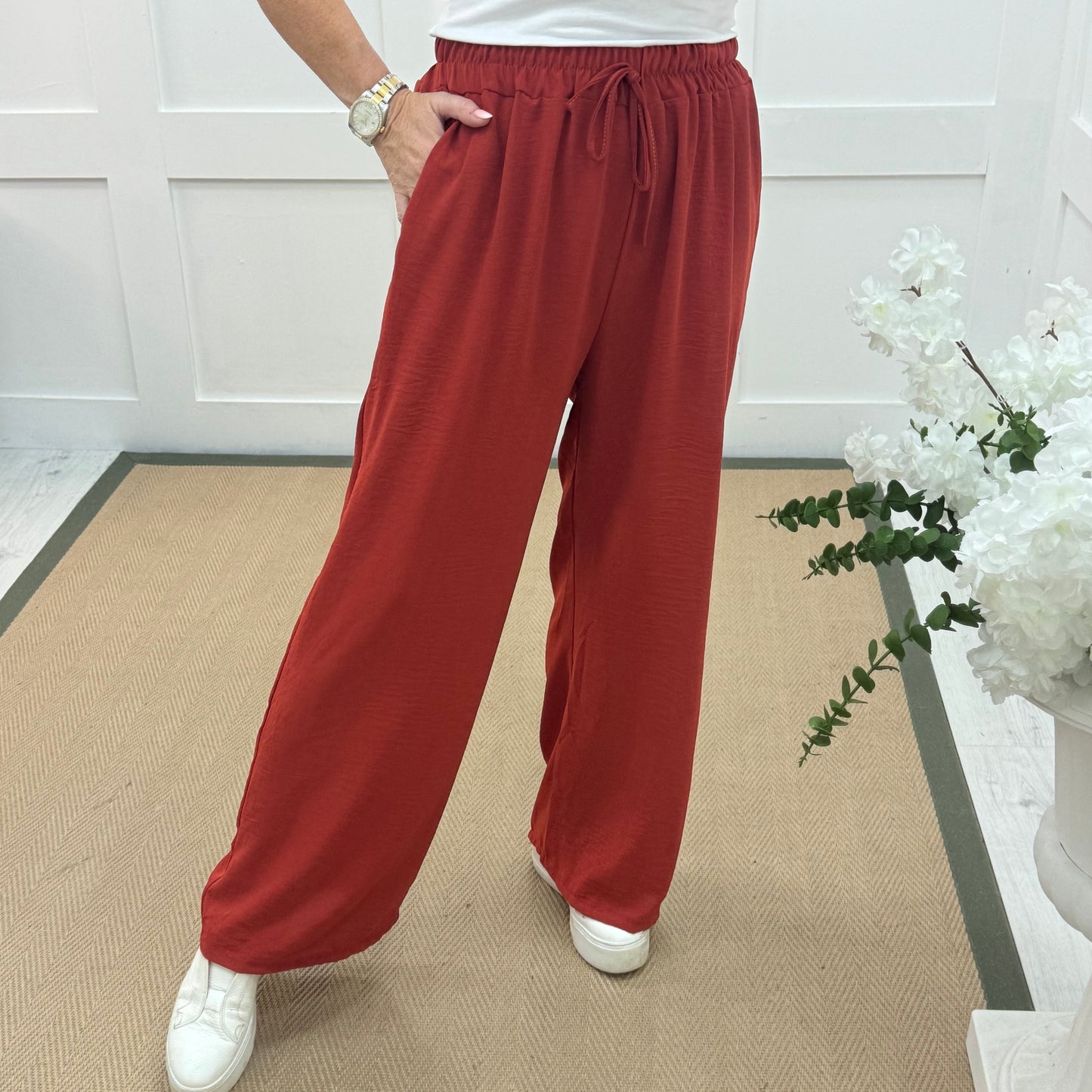 Esme: Orange pocket wide leg trousers. One size: 12-20