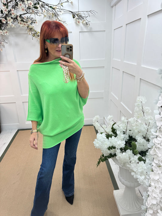 Samantha: Vibrant green asymmetrical slouch top. One size 10-18