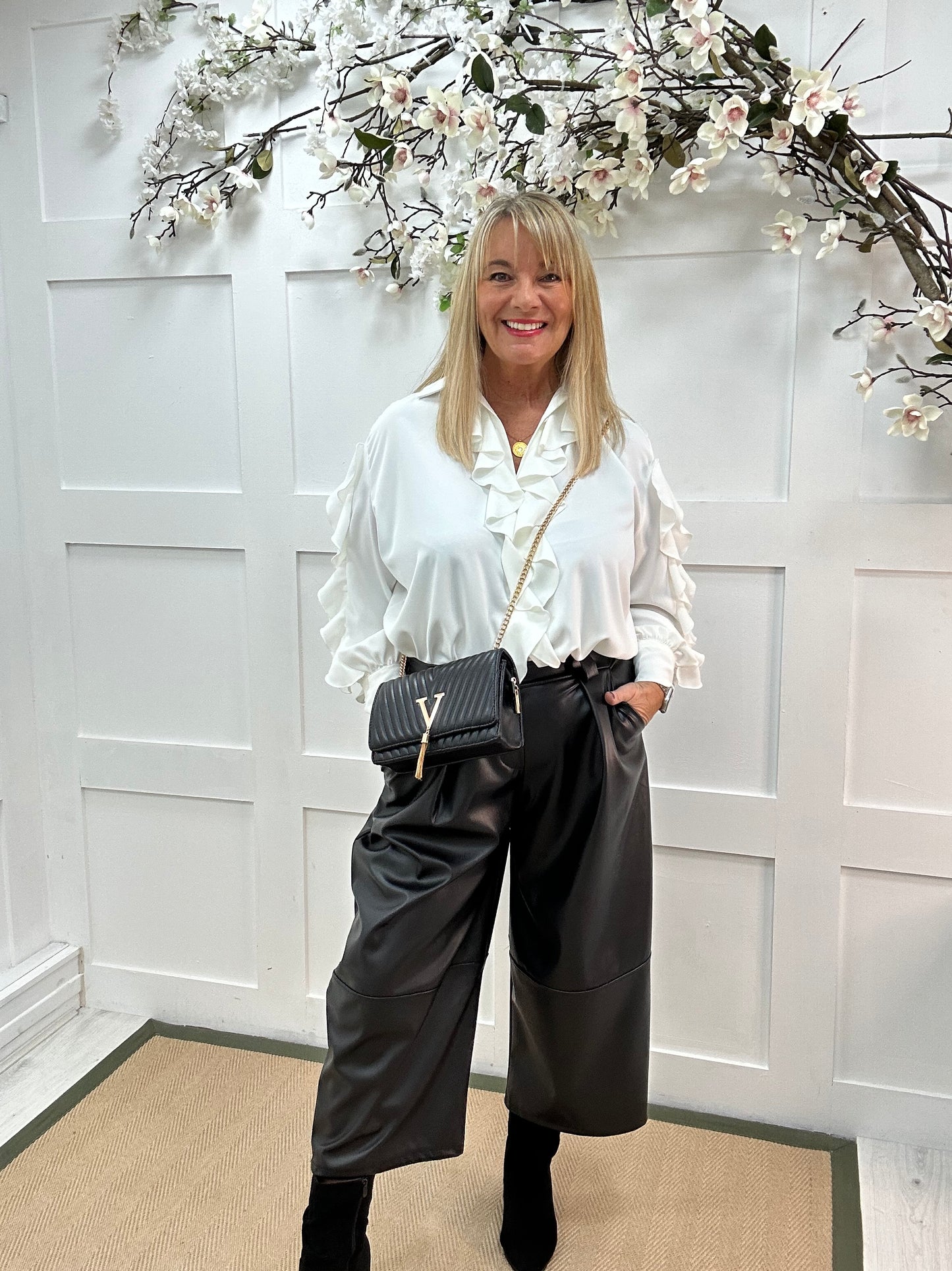 Riley: White ruffle blouse. One size 14-20