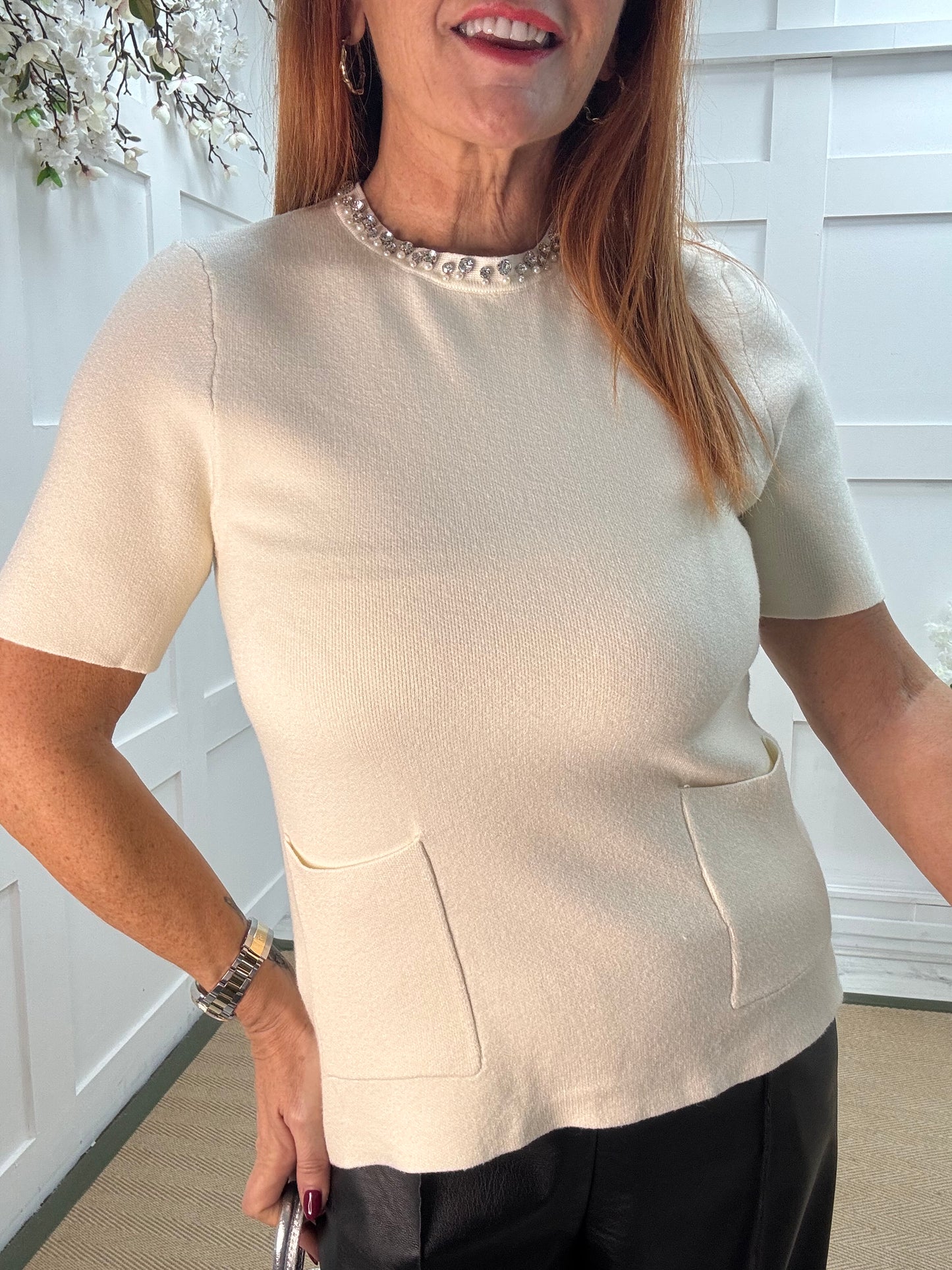 Rosheen: Winter white rhinestone pocket top. One size: 8-14