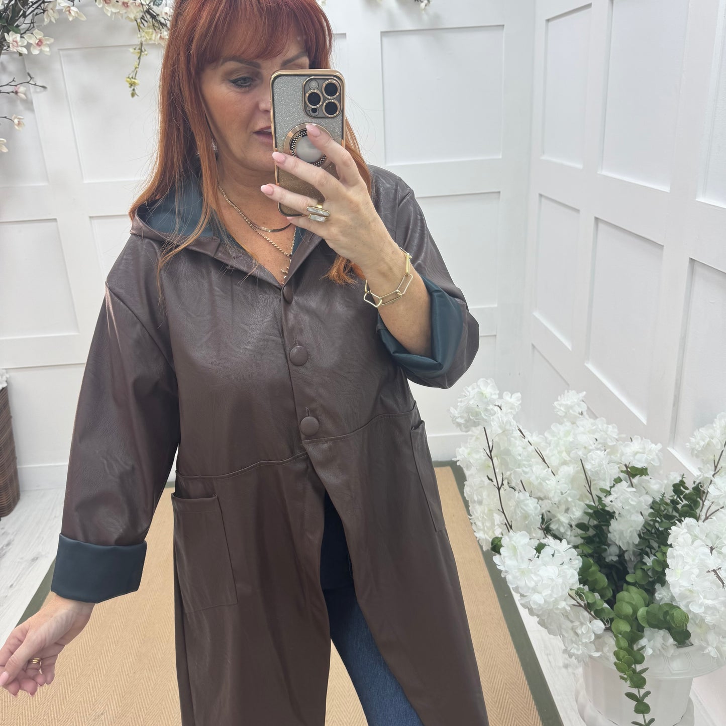 Alma: Brown long hooded raincoat. One size 12-18