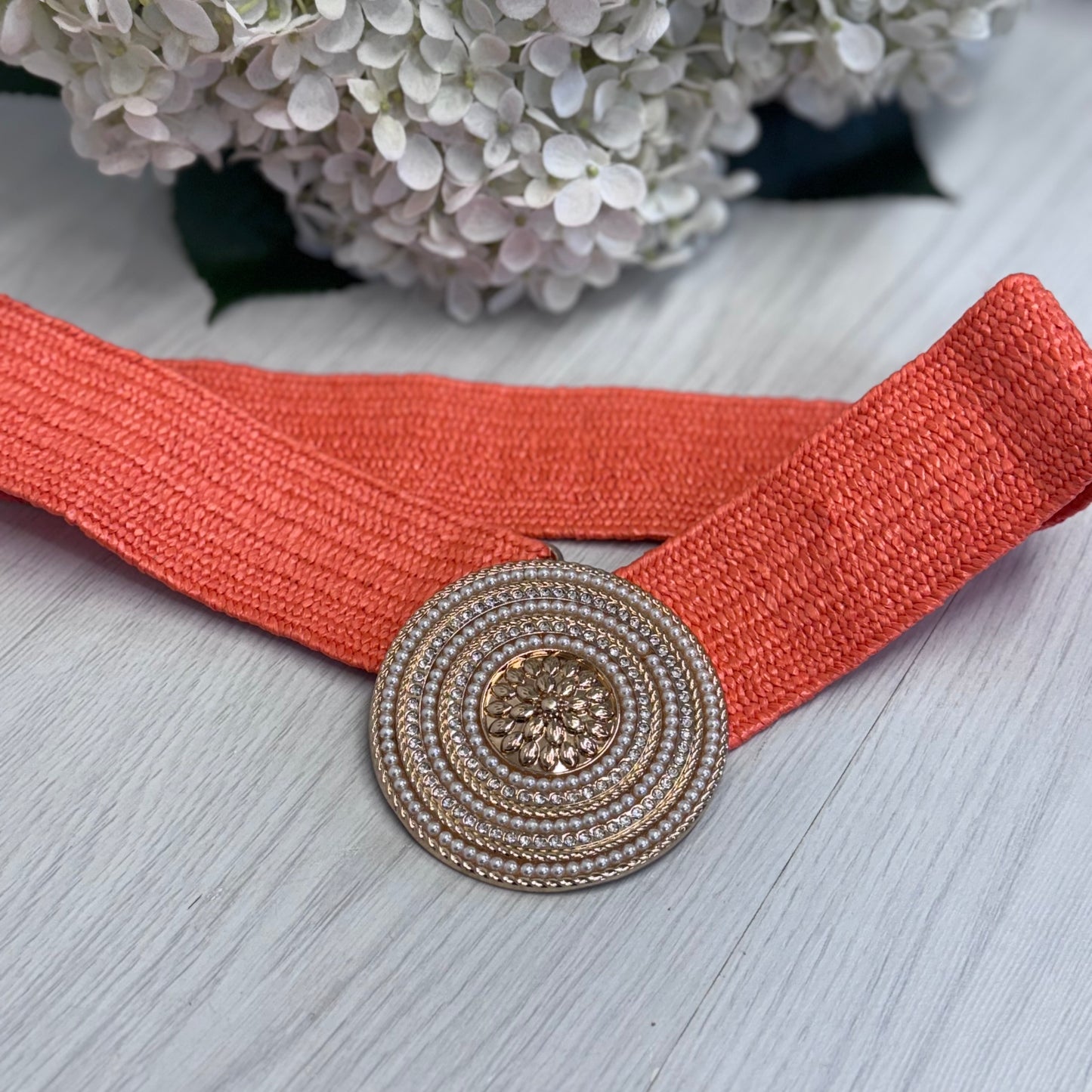 Perla: Orange round gold buckle wide belt. One size: 8-18