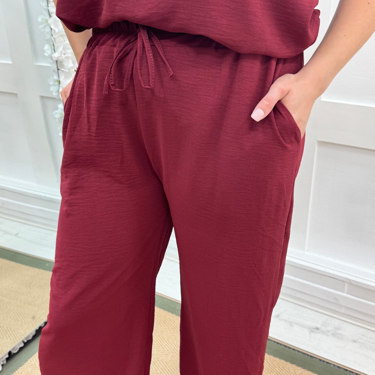 Esme: Burgundy pocket wide leg trousers. One size: 12-20