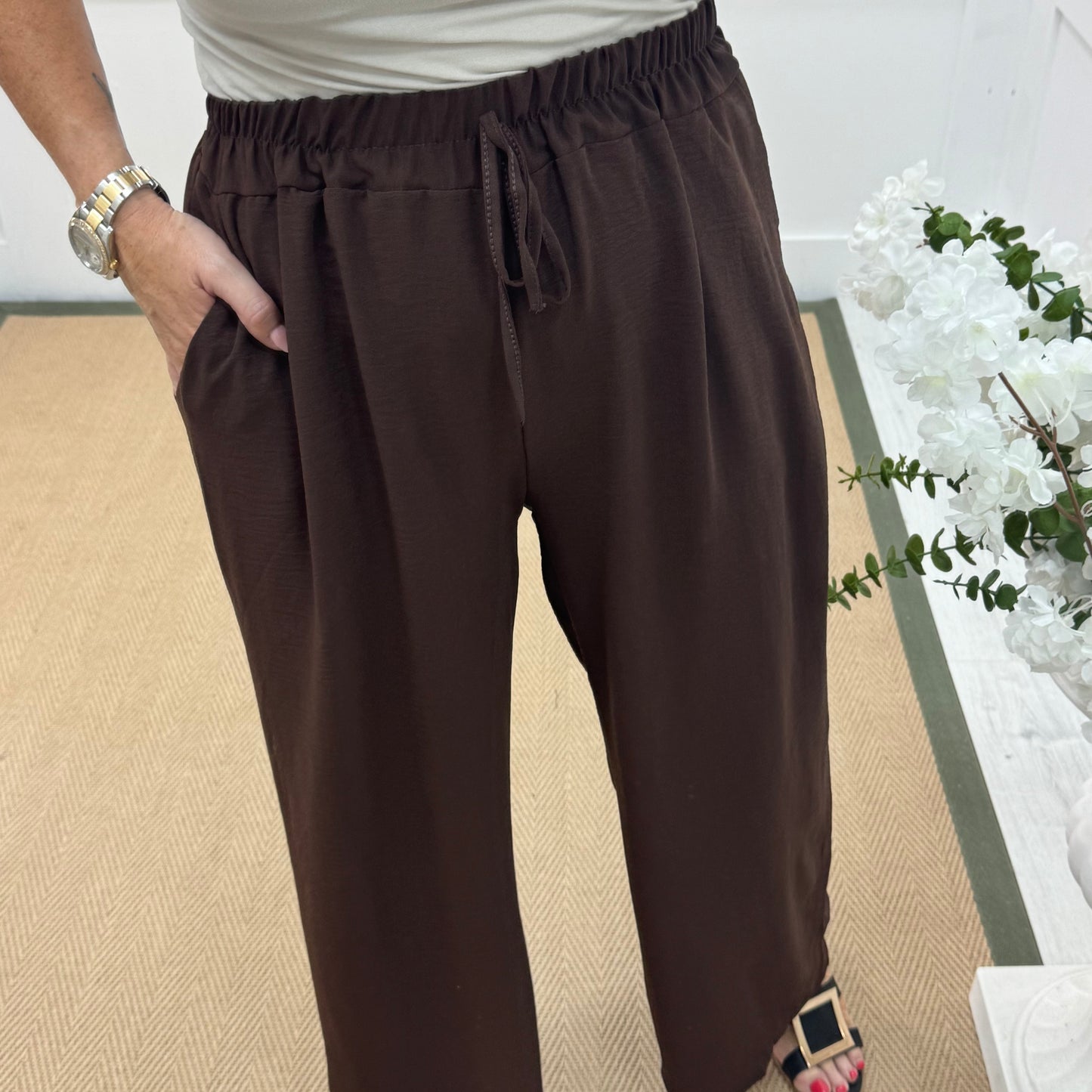 Esme: Brown pocket wide leg trousers. One size: 12-20