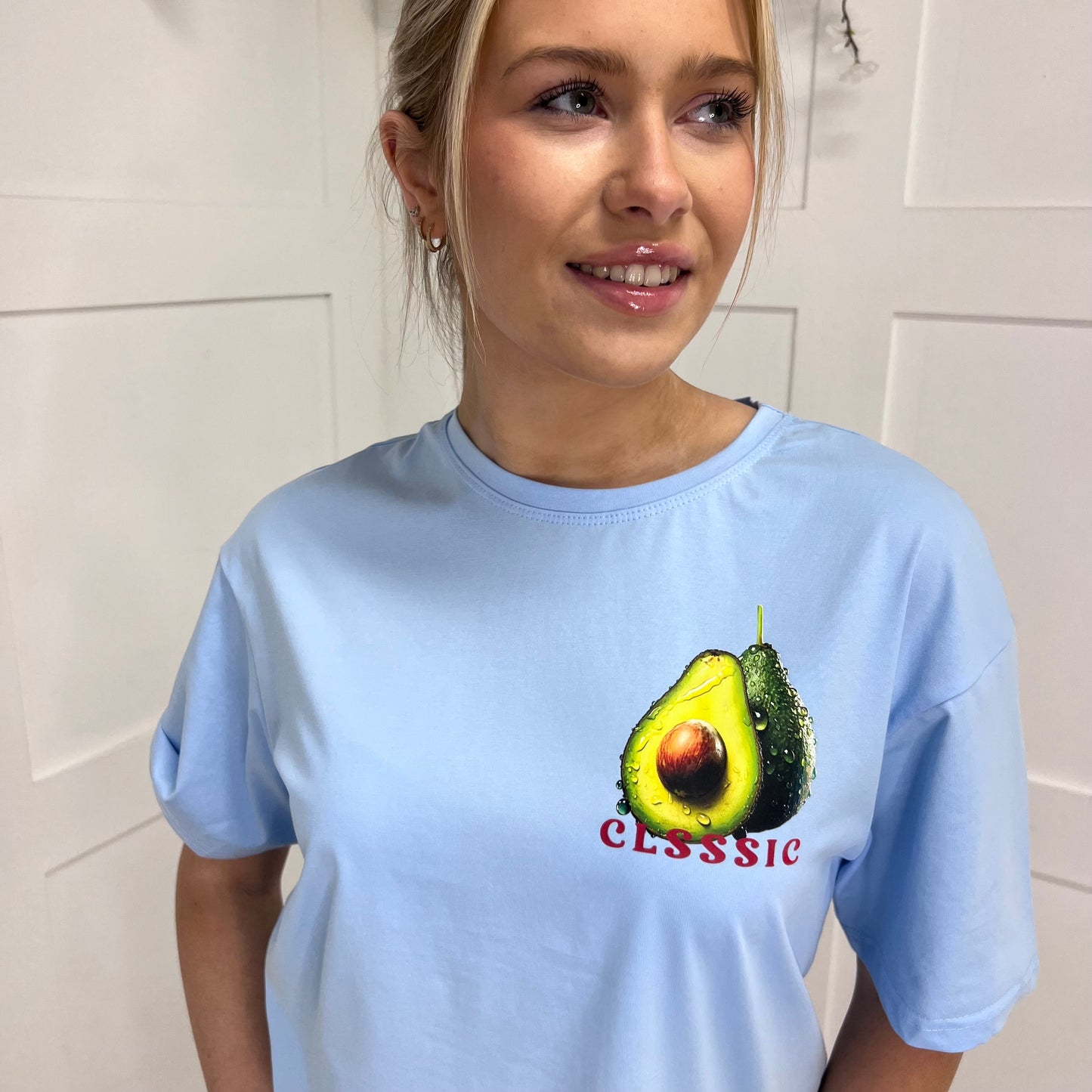 April: Blue rhinestone avocado T shirt. 2 sizes