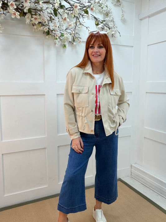 Jazz: Cream military style cinched waste jacket. One size 12-16