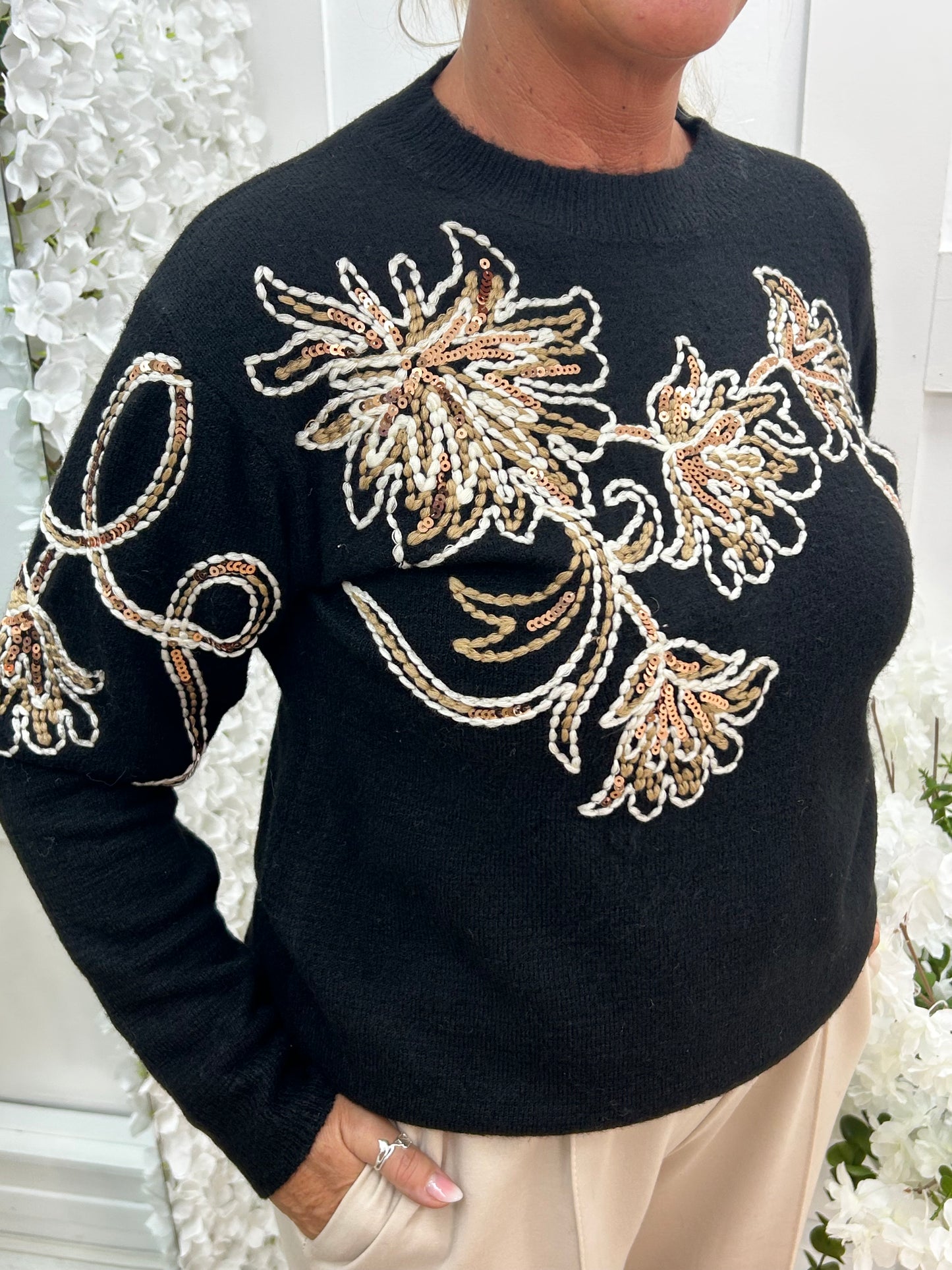 Honey: Black sequin floral knit top. One size: 10-16