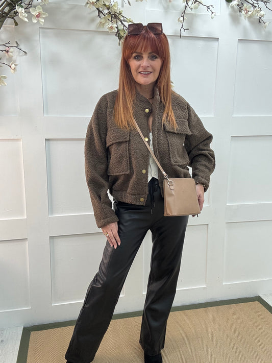 Kleo: Brown short boucle bomber jacket. One size: 12-18