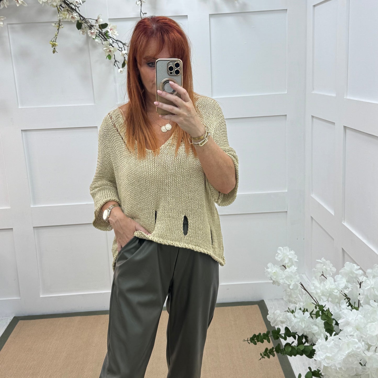 Tatum: Khaki faux leather button trousers. One size: 14-18