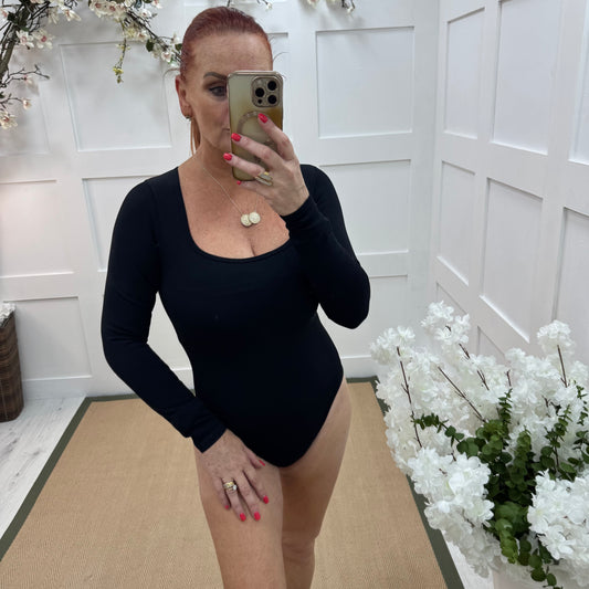 April: Black stretchy waist cinch bodysuit. 2 sizes