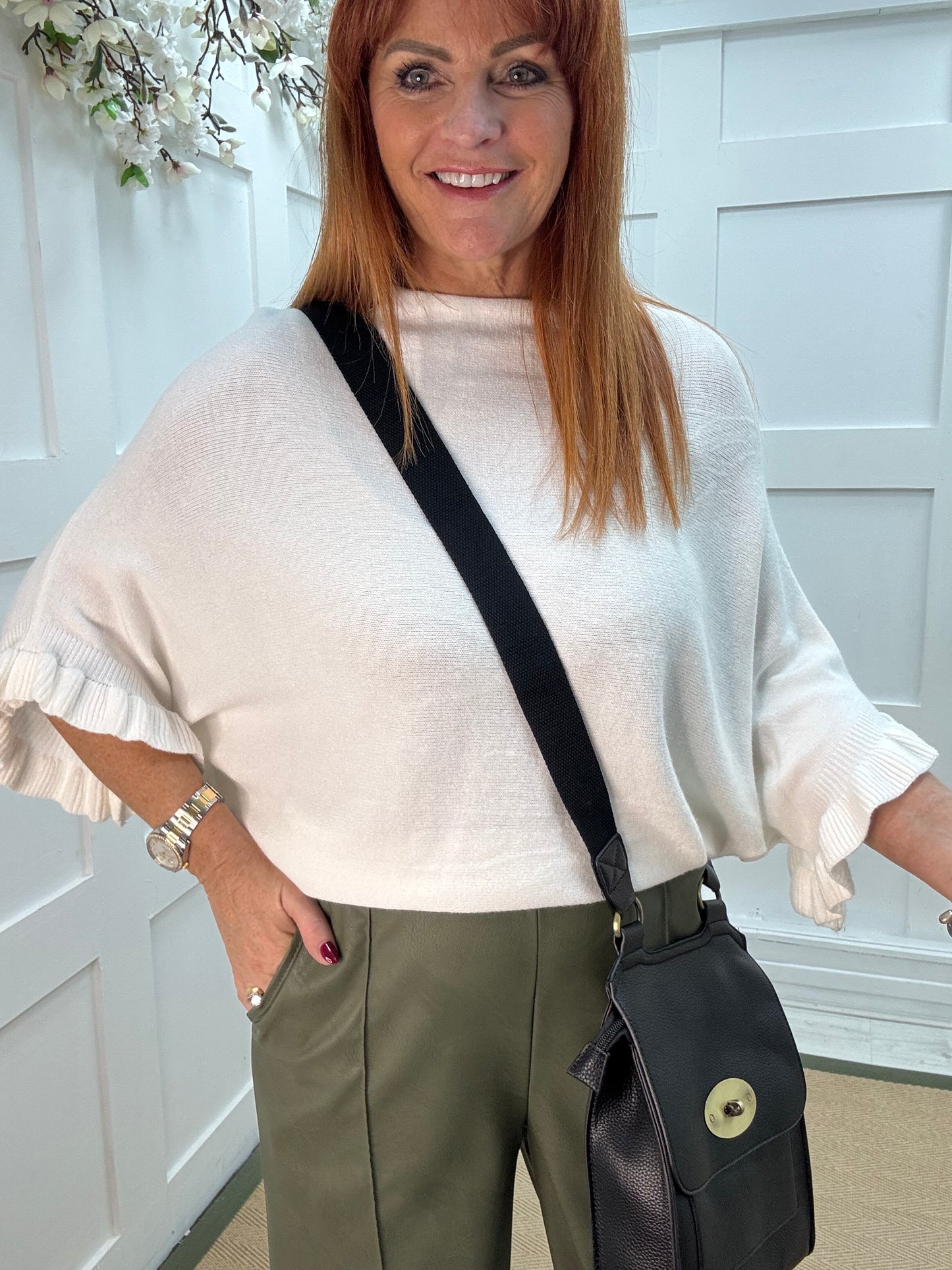 Sierra: White batwing fluted sleeve knitted top. One Size 12-18/20