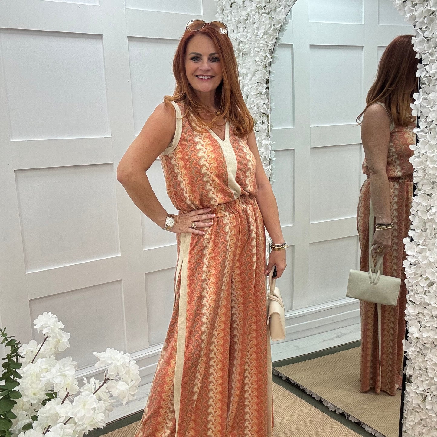 Pasha: Orange zigzag top & printed trouser co-ord set. One size: 12-18