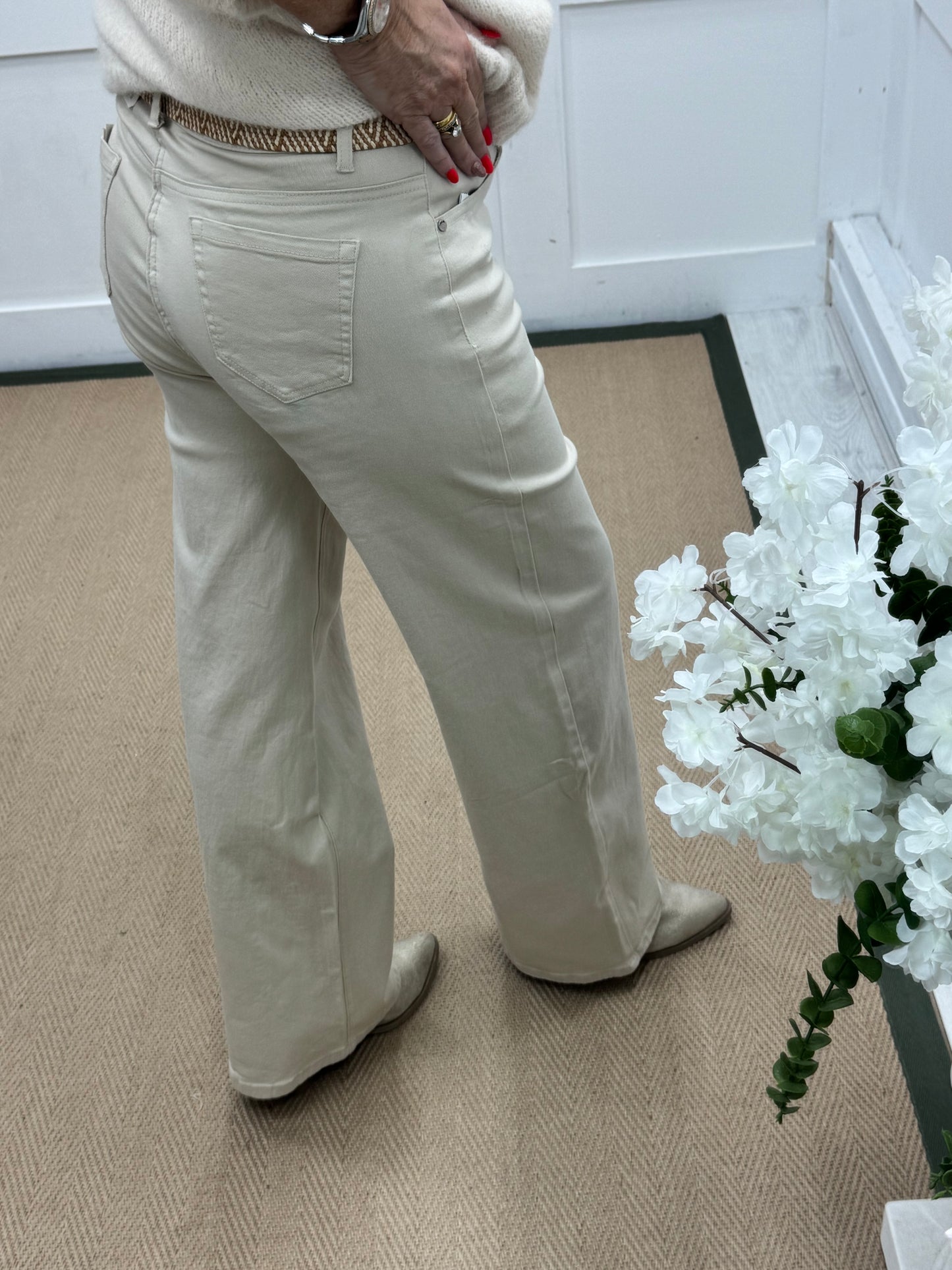 Cora: Cream wide leg jeans. Sizes: 10-20