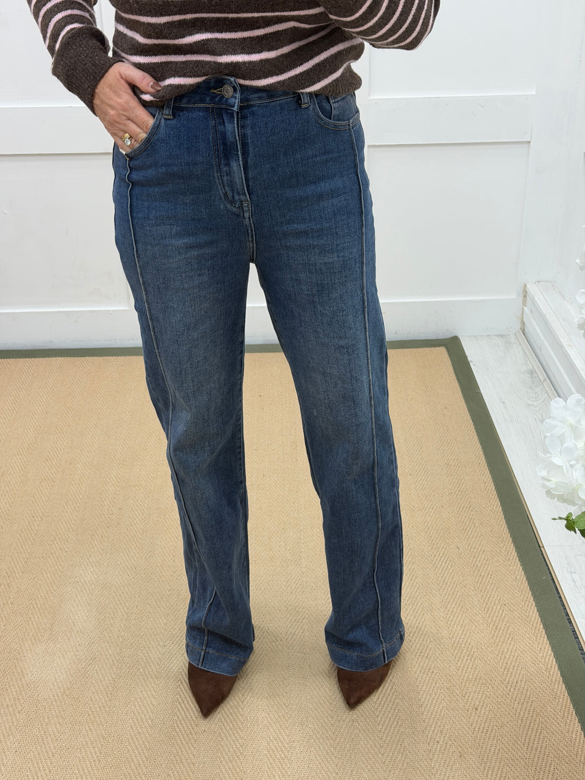 Raye: Mid blue wide leg jeans with raised seam. Sizes: 8-16