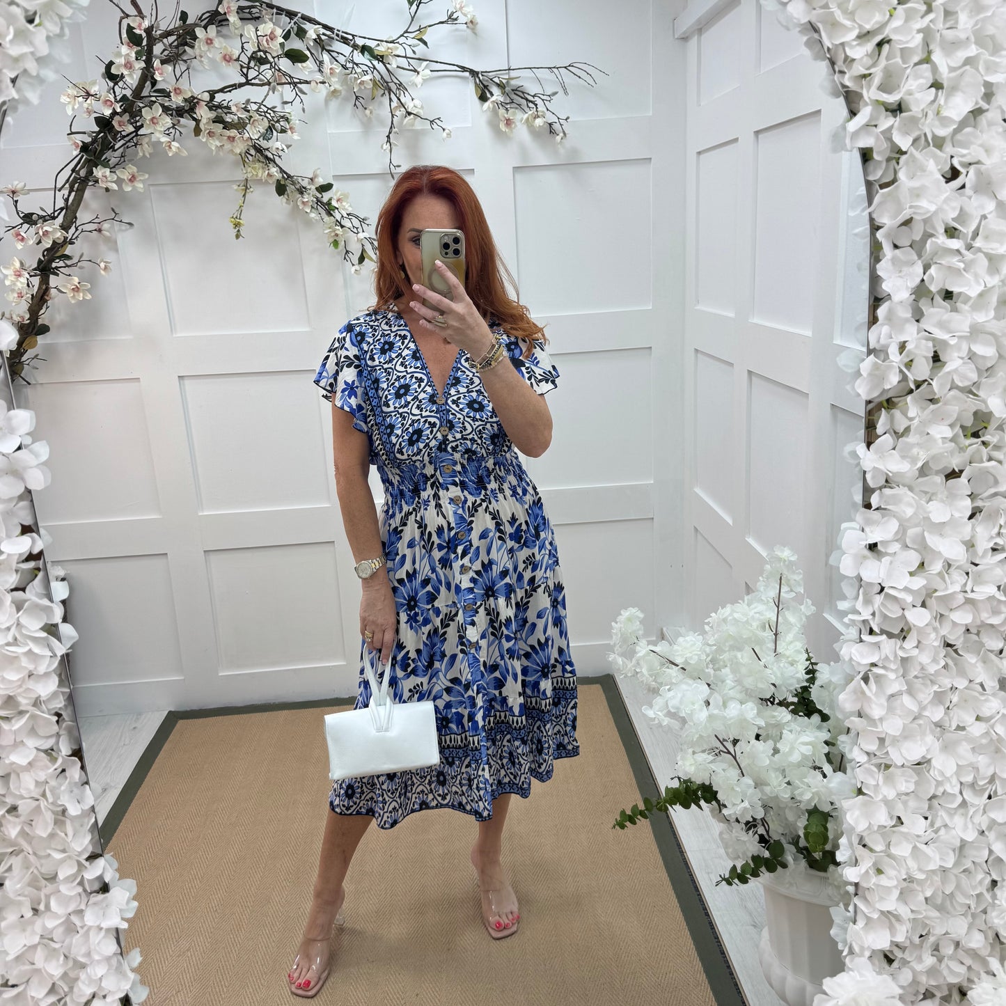 Emmy: Blue & white floral stretchy V neck midi dress. One size: 10-20