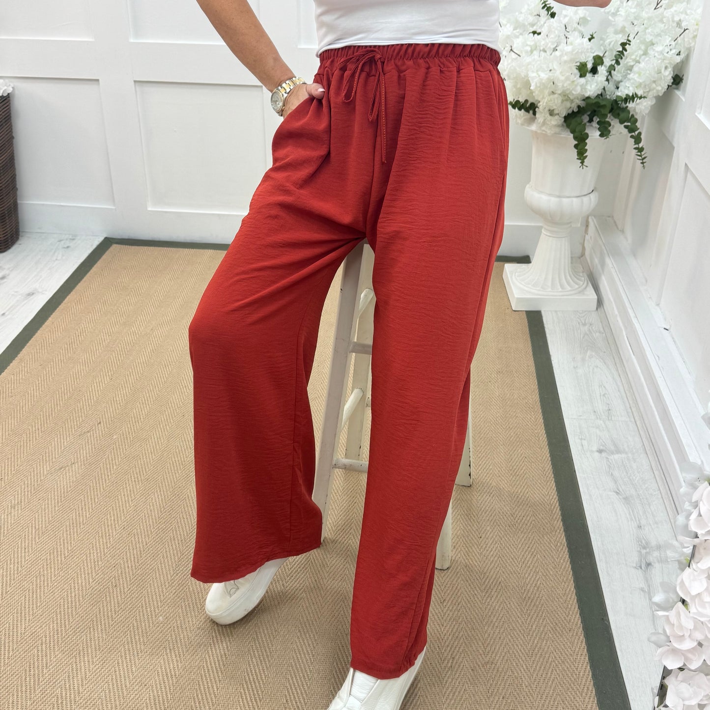 Esme: Orange pocket wide leg trousers. One size: 12-20