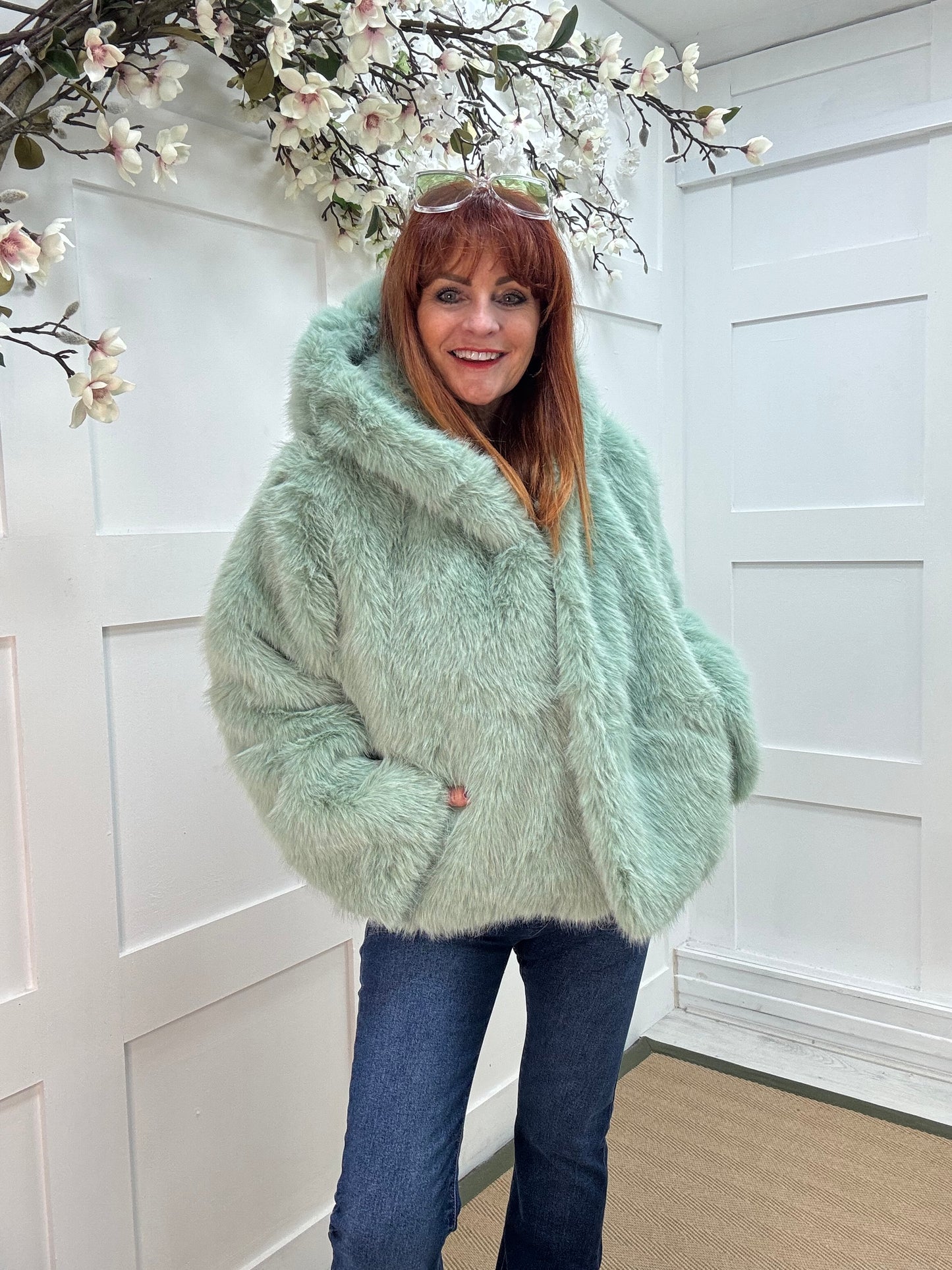 Foxy: Mint green short faux fur hooded jacket. One size 12-16