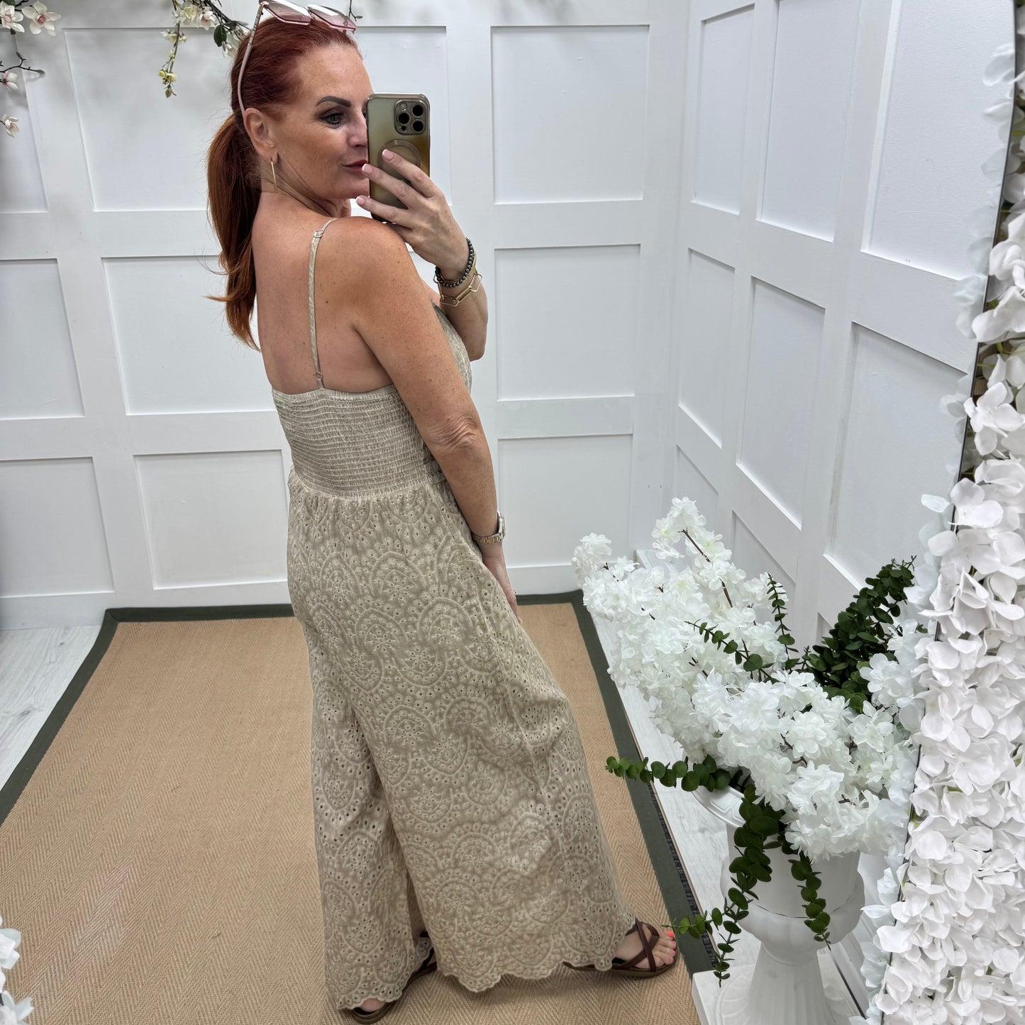 Bria: Stone broderie Anglaise strappy jumpsuit. One size: 10-14