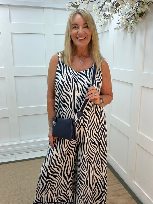 Zoe: Navy zebra print wide leg jumpsuit with belt. 3 sizes.