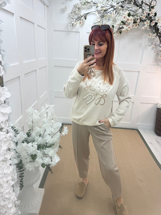 Liana: Cream diamanté logo sweatshirt. One size: 12-16