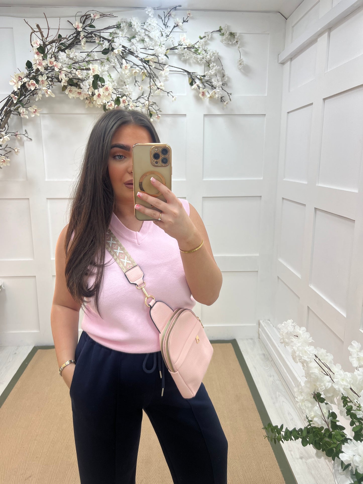 Tara: Pink V neck tank top. One size: 10-14