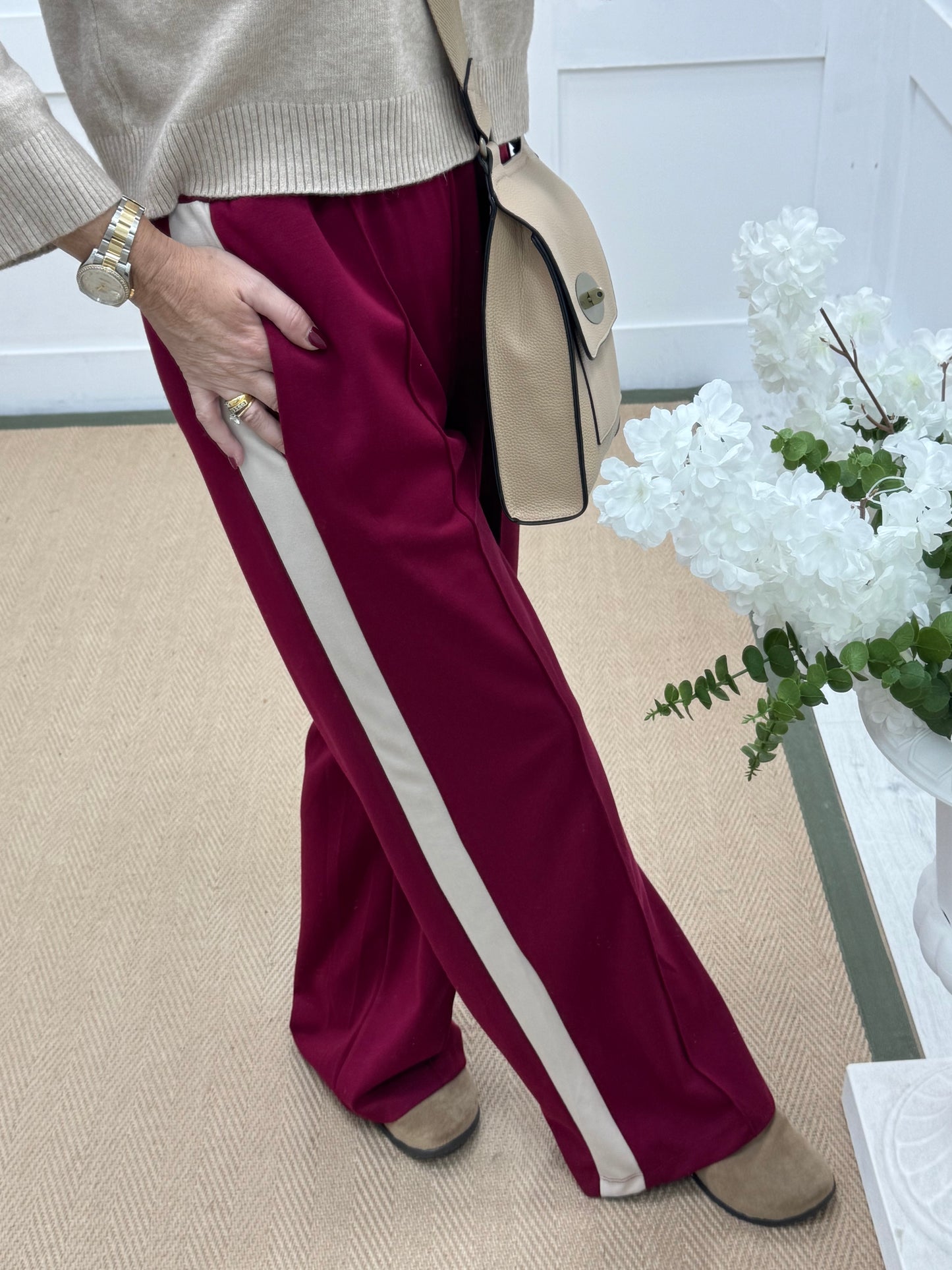 Savanna: Burgundy cream sport stripe stretchy wide leg pocket trousers. One size 10-16