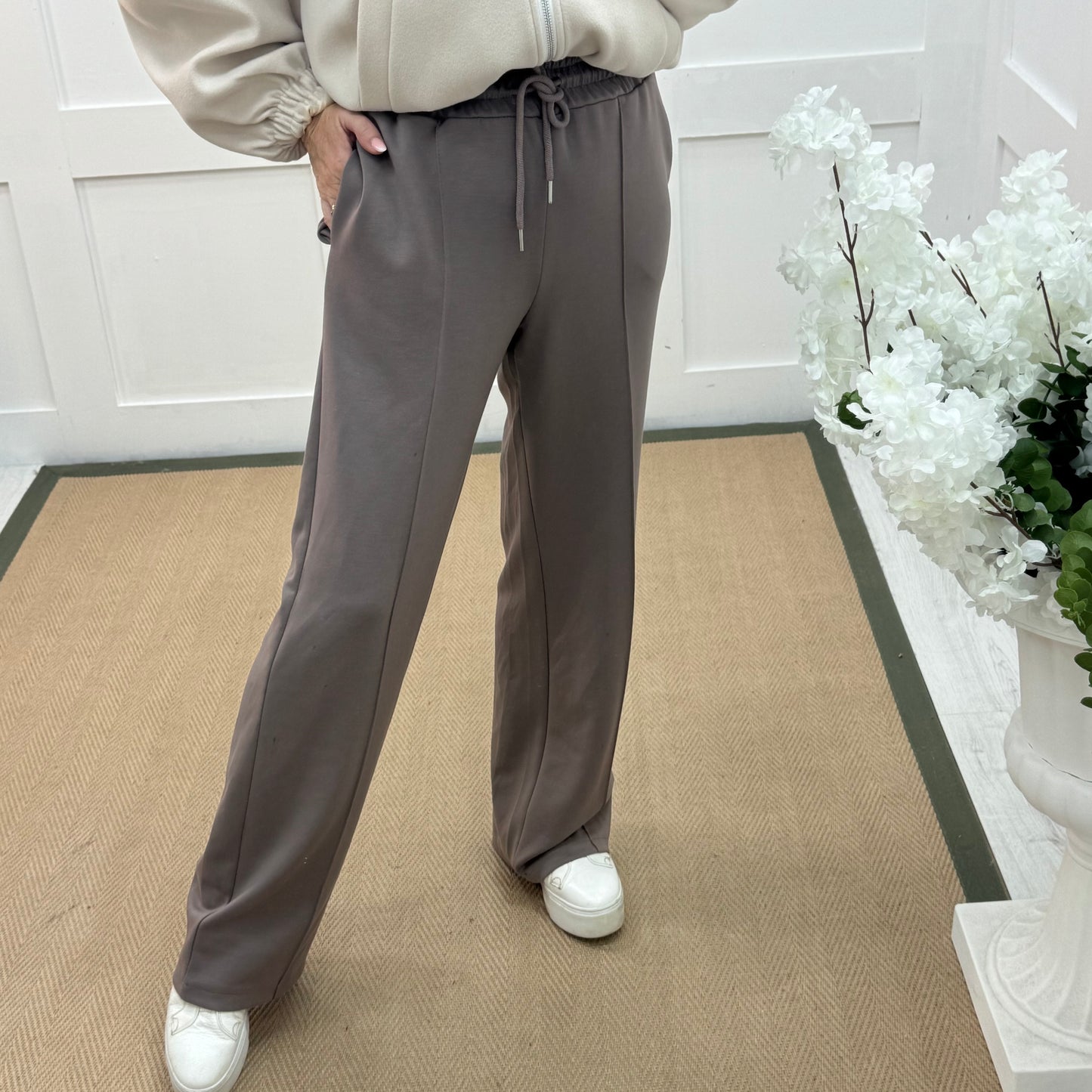 Trudy: Taupe stretchy wide leg pocket trousers. 2 sizes