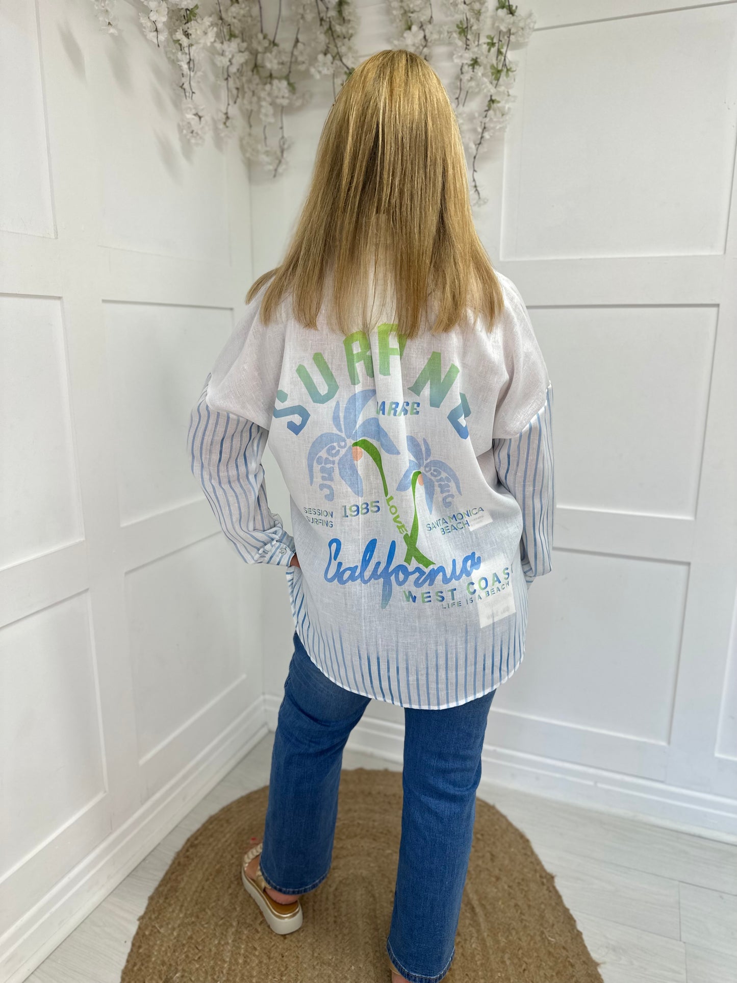 Stacie: Blue palm tree & script diamanté shirt. One size: 14-20